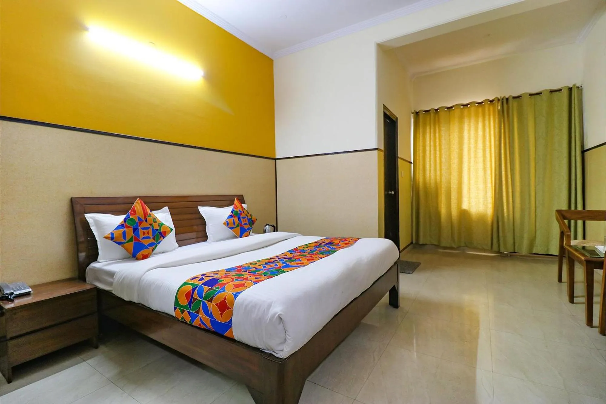 Bed in FabHotel Elite Peak