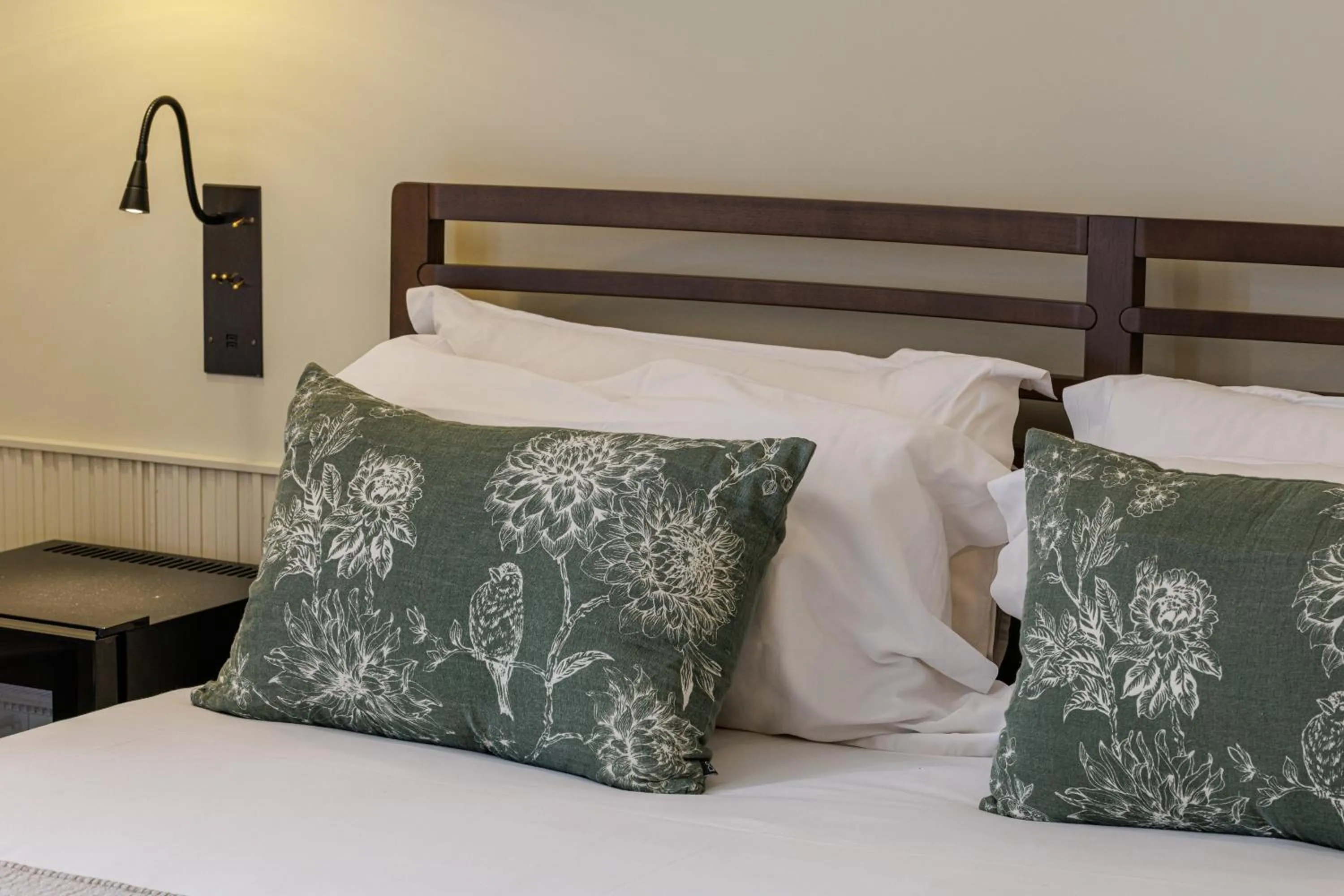 Bed in Le Dortoir Boutique Suites