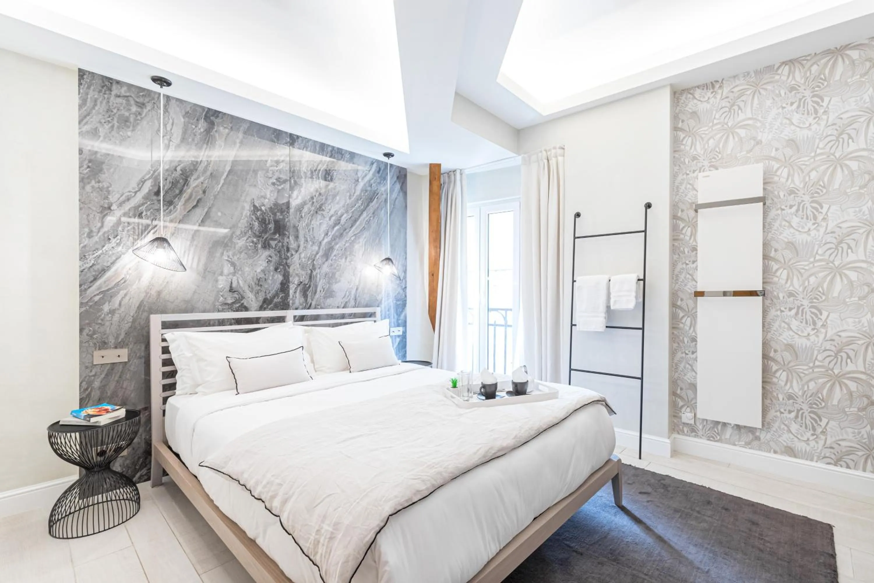 Bed in Le Dortoir Boutique Suites