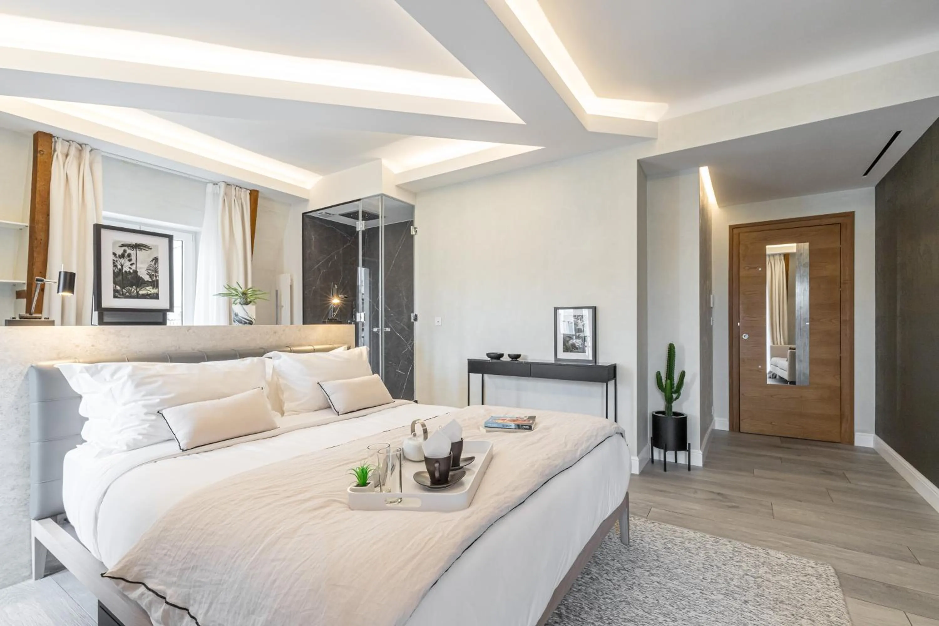 Bed in Le Dortoir Boutique Suites