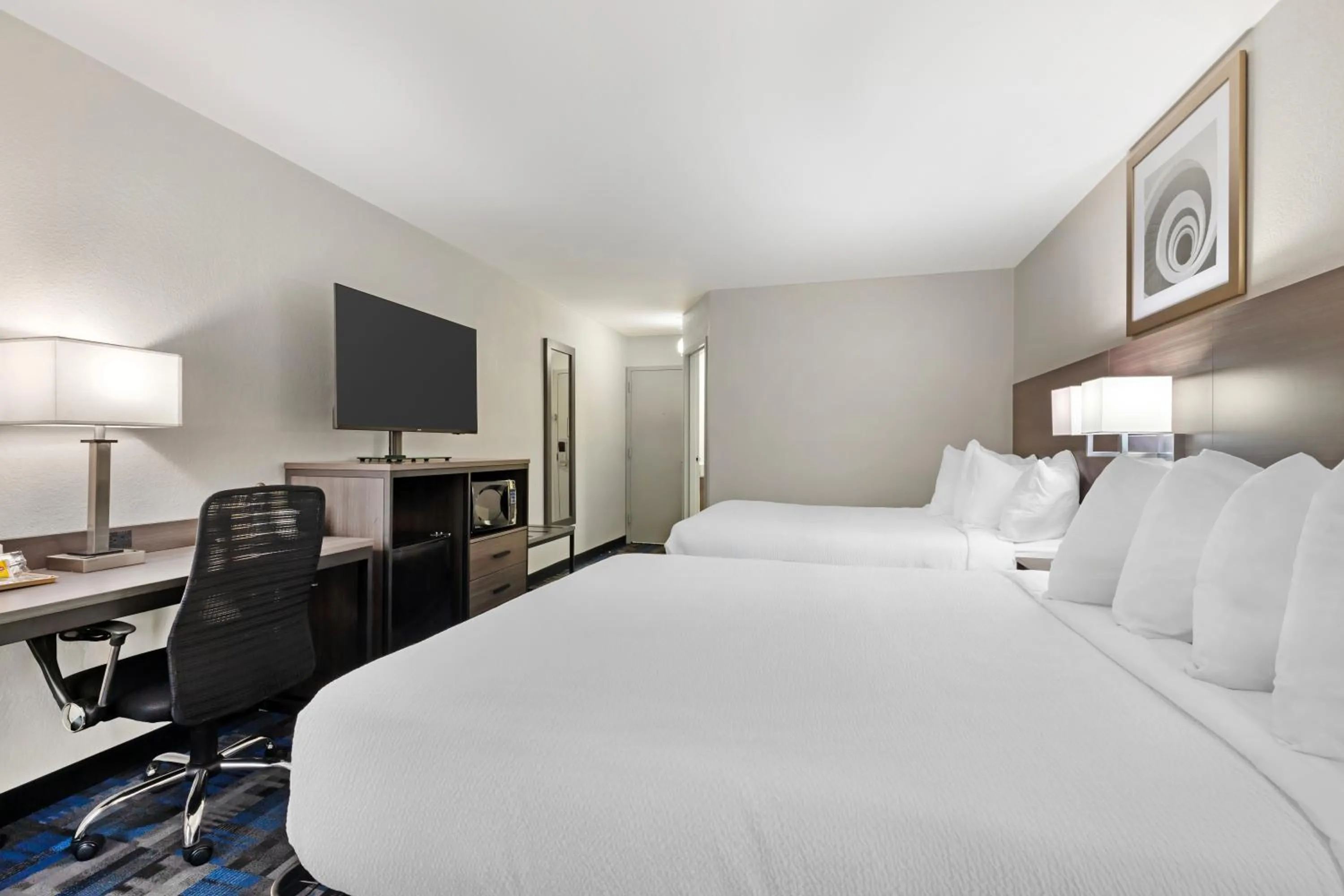 Bed in Quality Inn Mystic