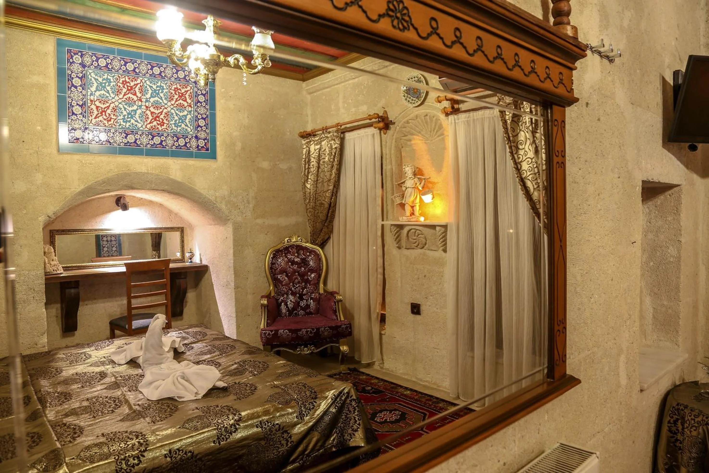 Bed in Goreme Palace Cave Suites