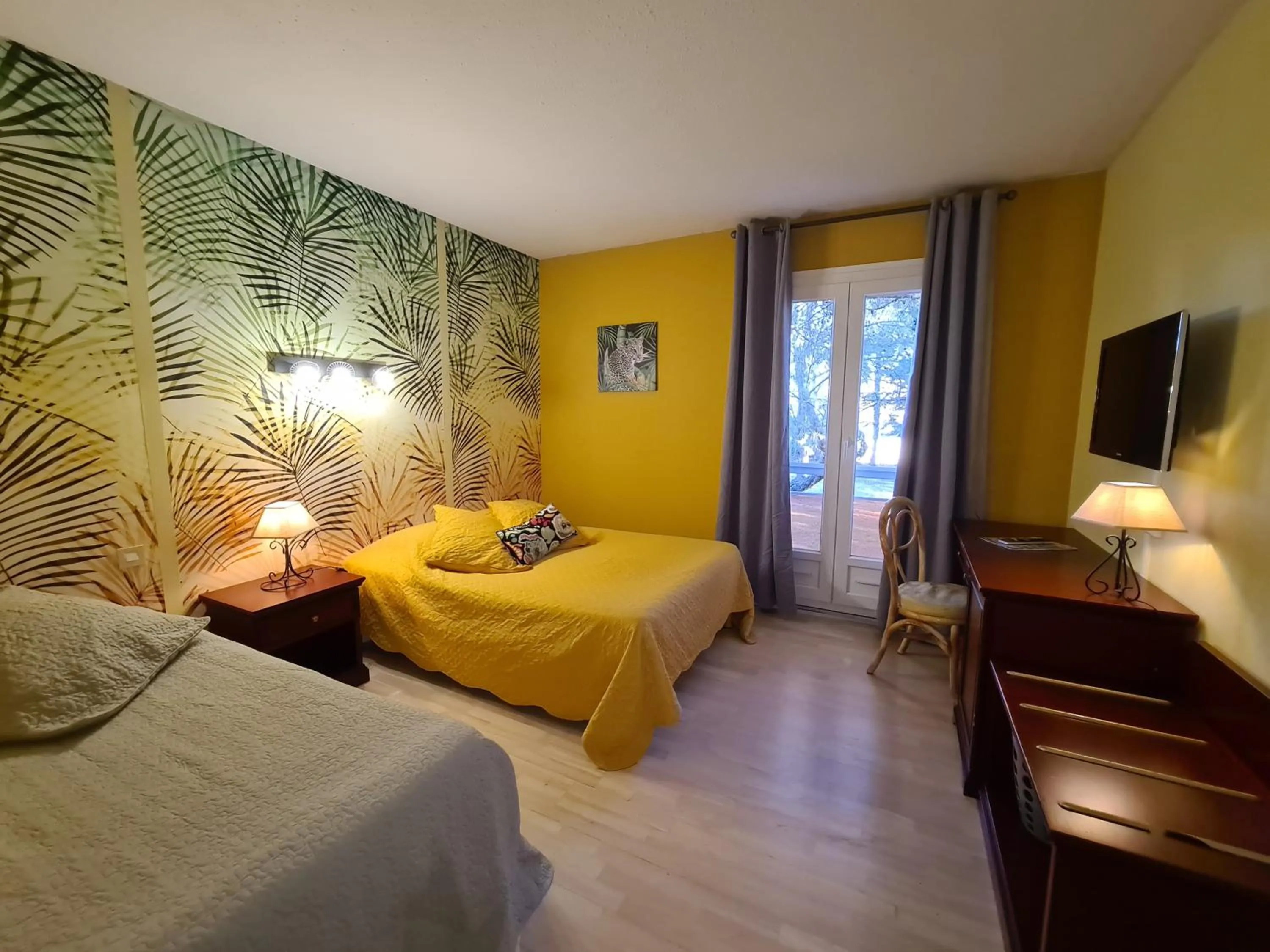 Photo of the whole room, Bed in Hôtel Restaurant Le Mas De L'Olivier