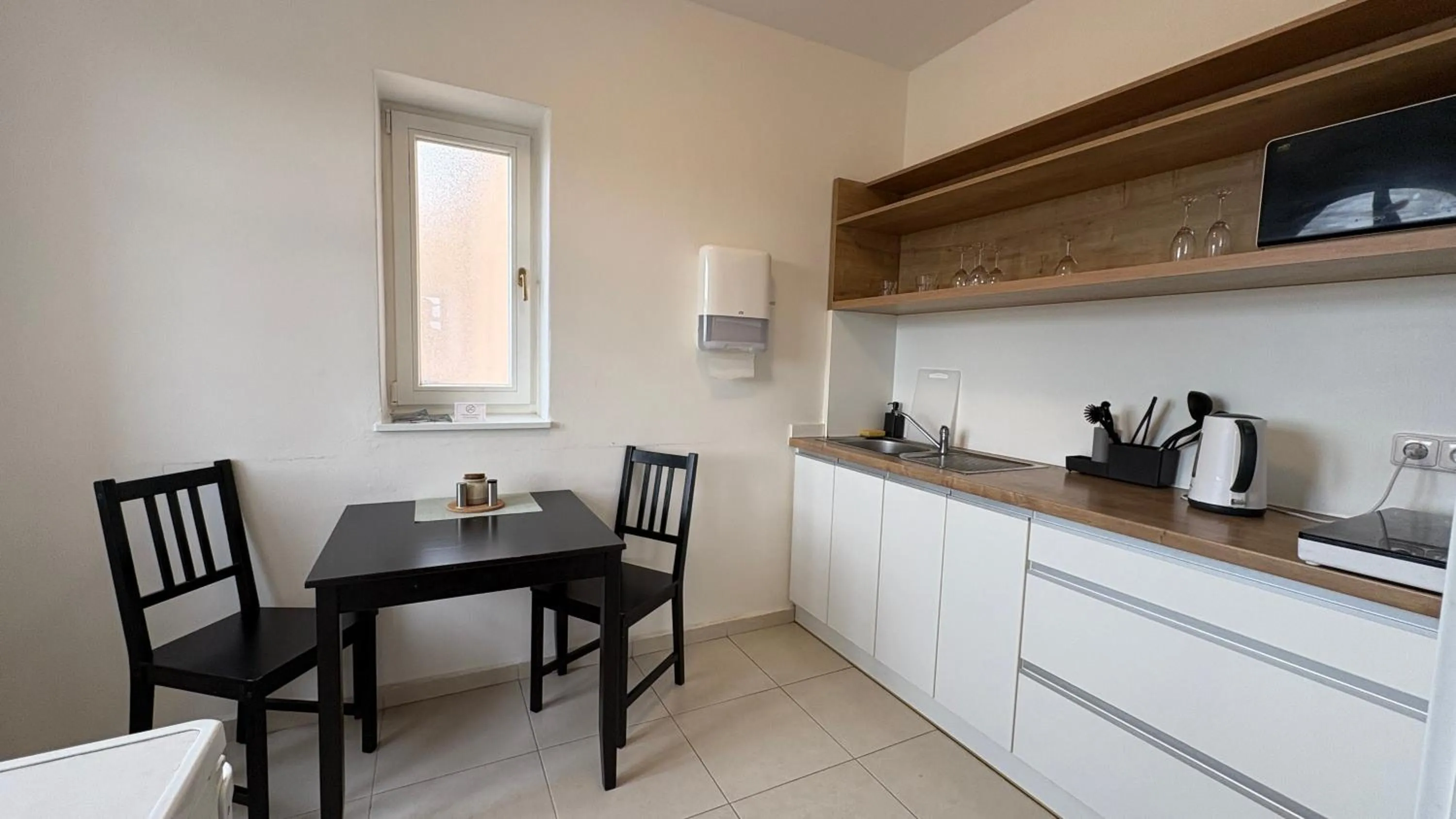 Kitchen or kitchenette in B&B Hotel Praha