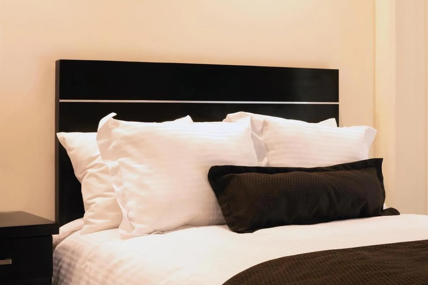 Bed in Sendero Hotel