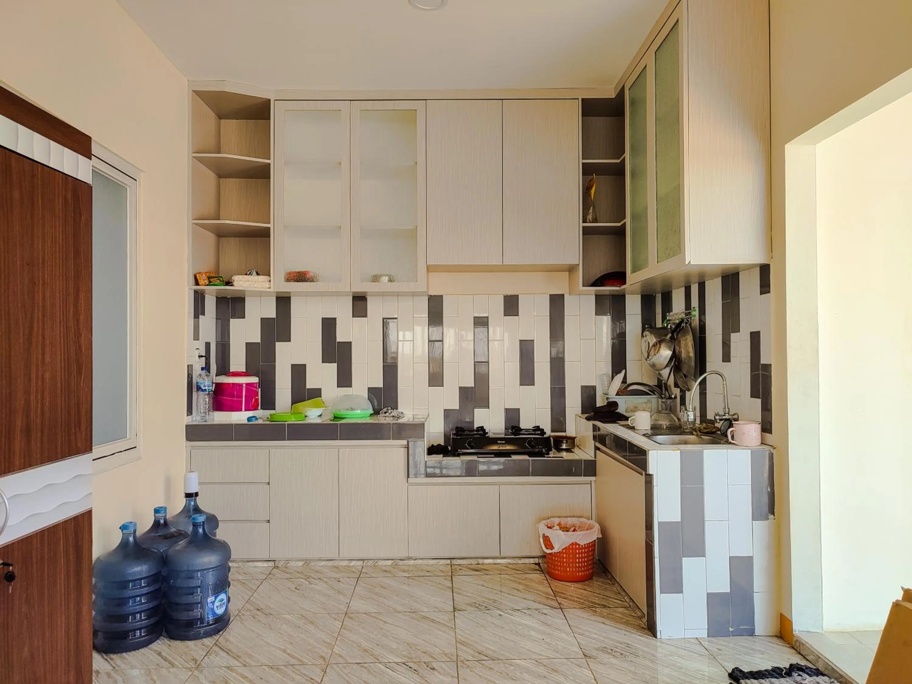 Kitchen or kitchenette in La Tana Hotel