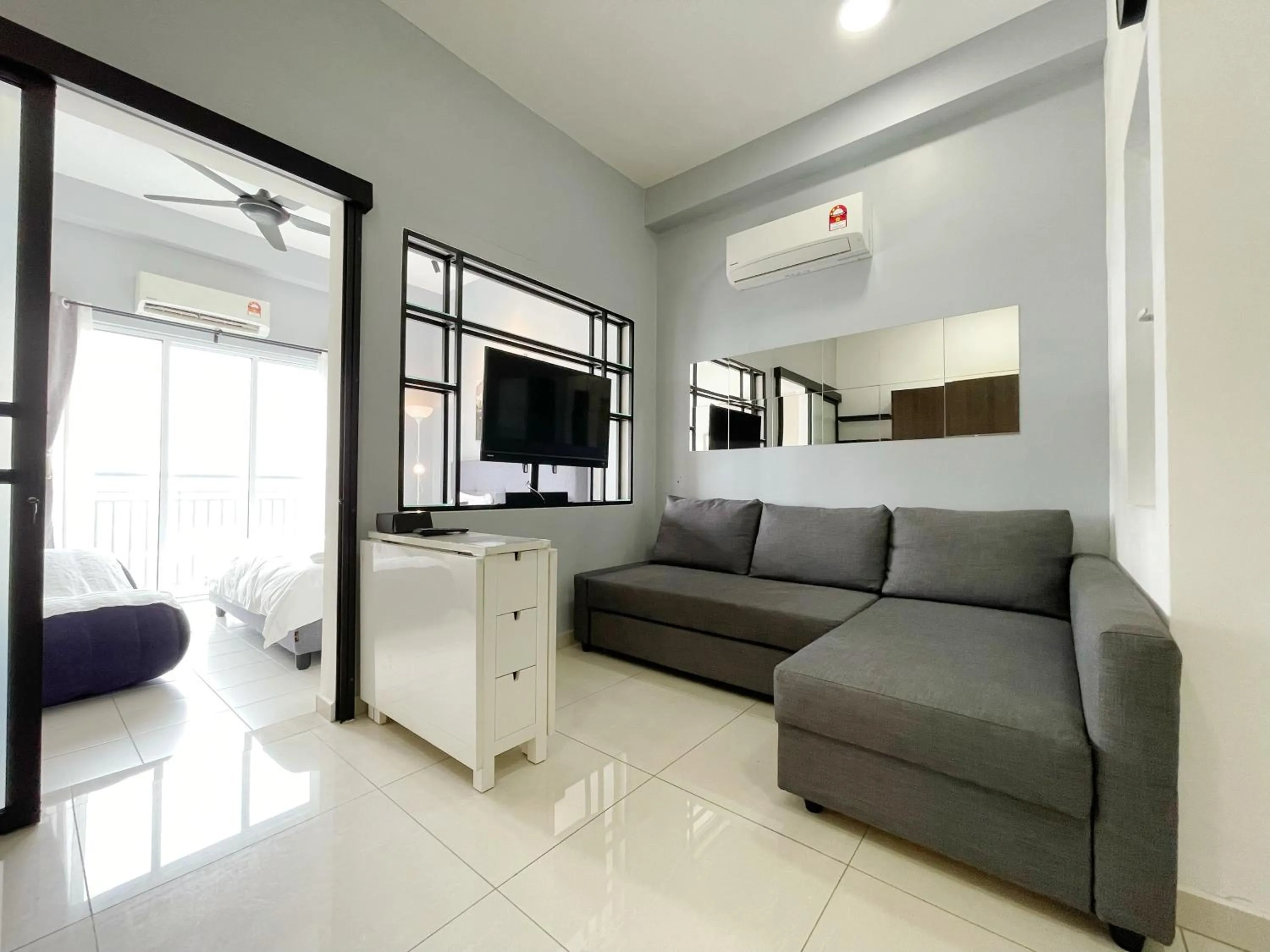 Living room in MesaHill Homestay, Nilai by S&T Homez