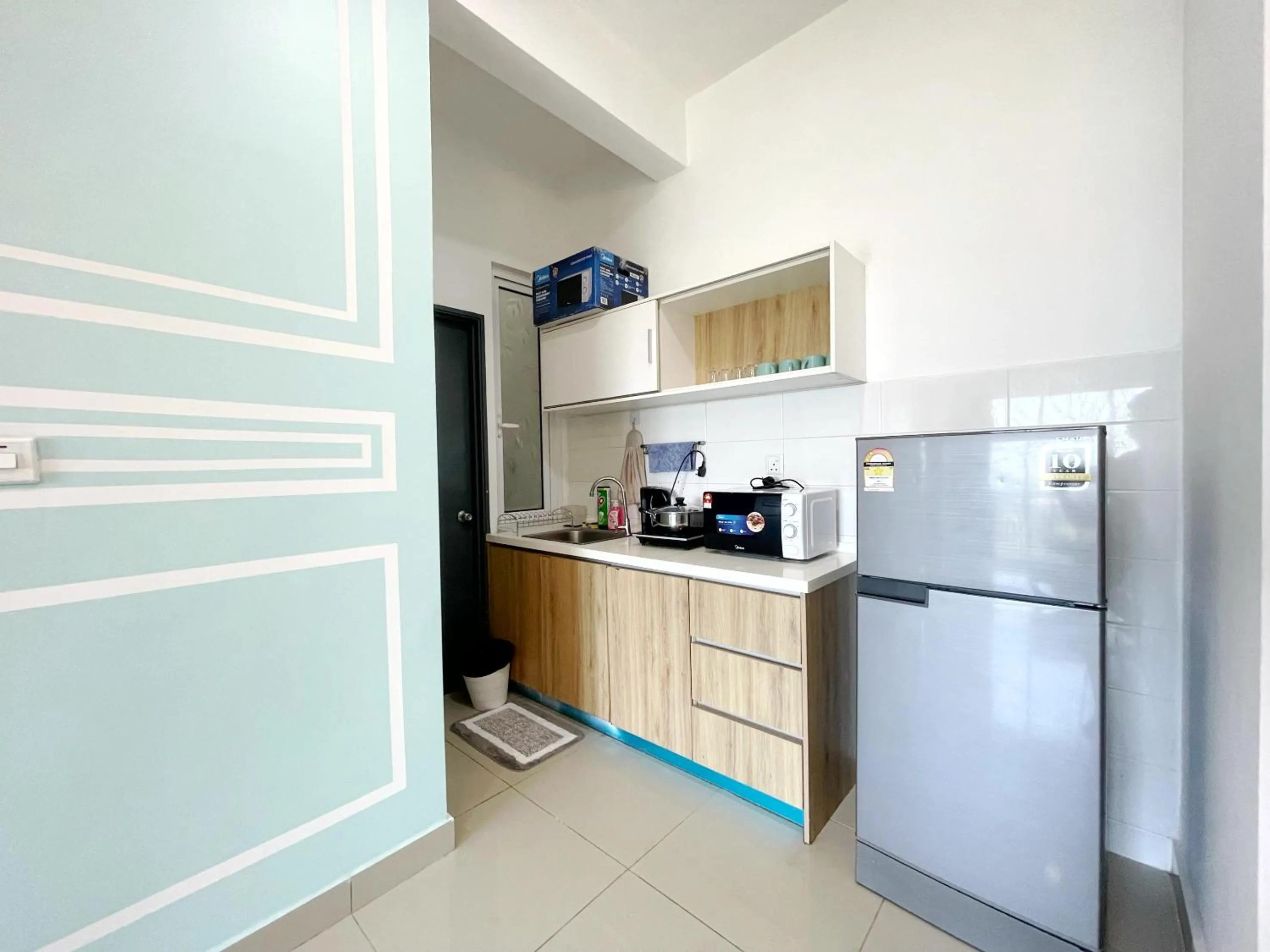 Kitchen or kitchenette in MesaHill Homestay, Nilai by S&T Homez