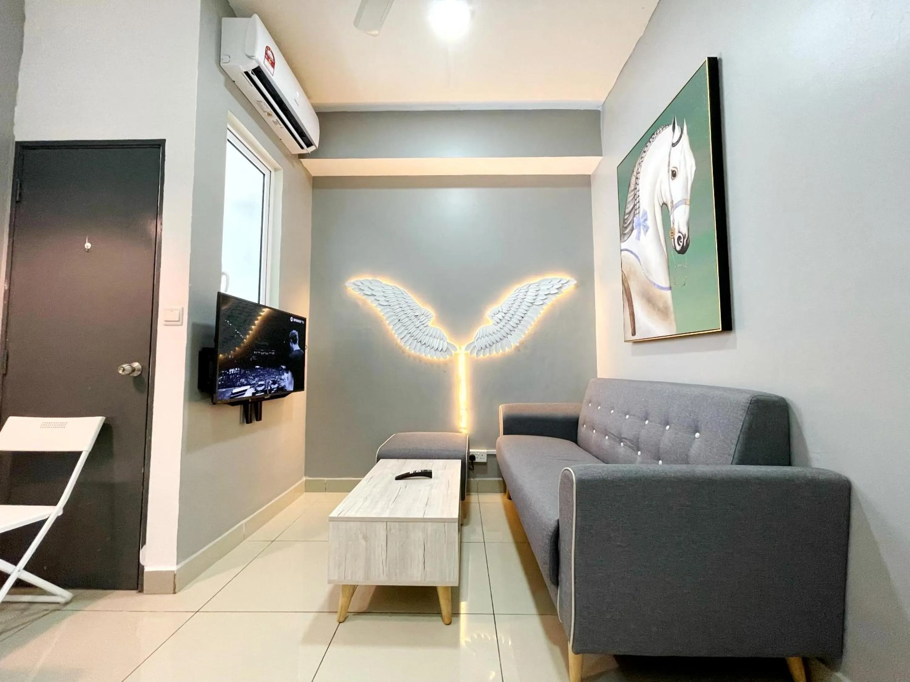 Living room in MesaHill Homestay, Nilai by S&T Homez