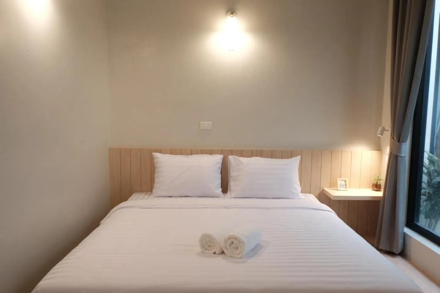 Bed in THE BELONG BOUTIQUE HOTEL