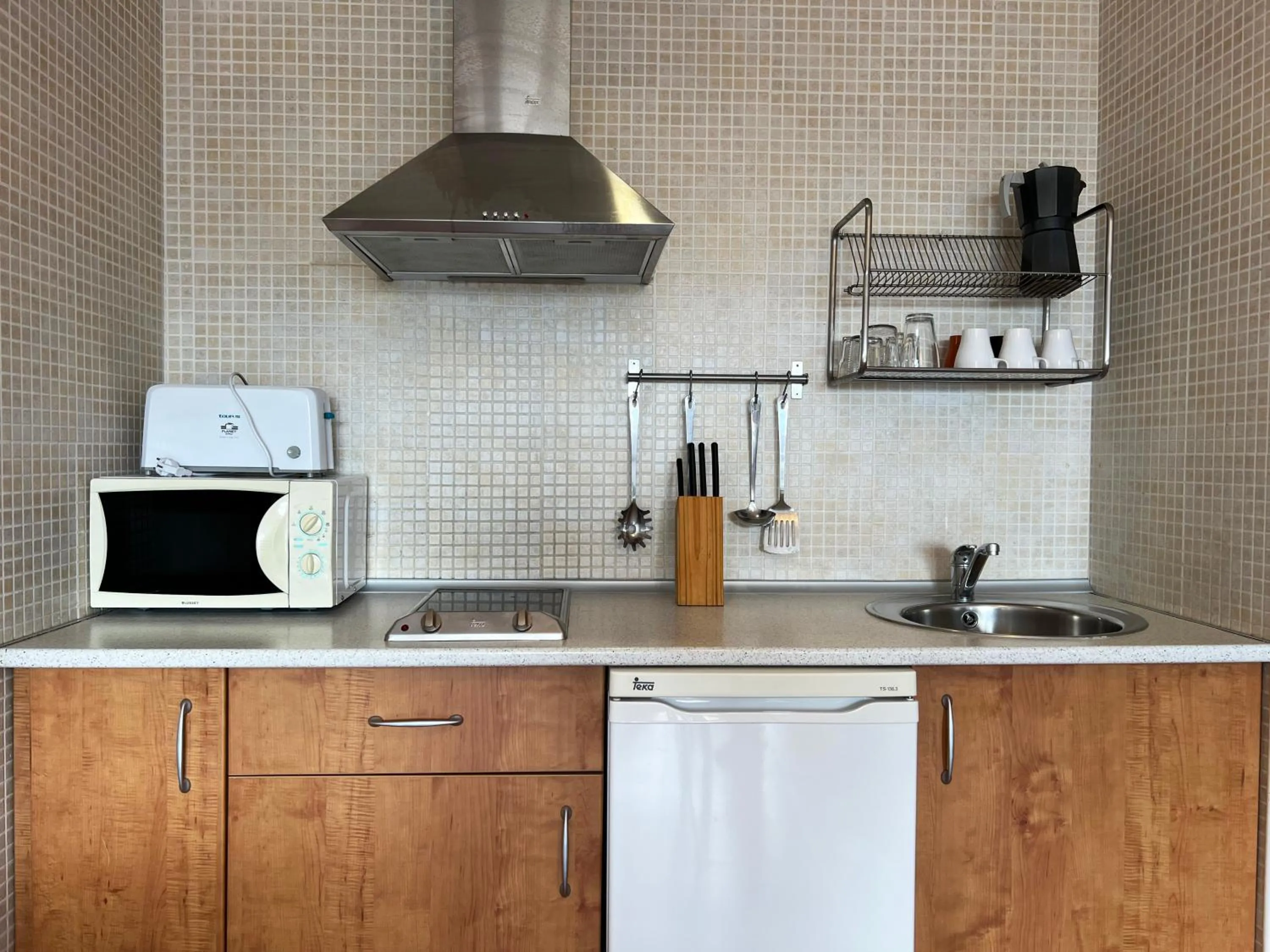 Kitchen or kitchenette in Apartamentos Sierra Nevada 3000