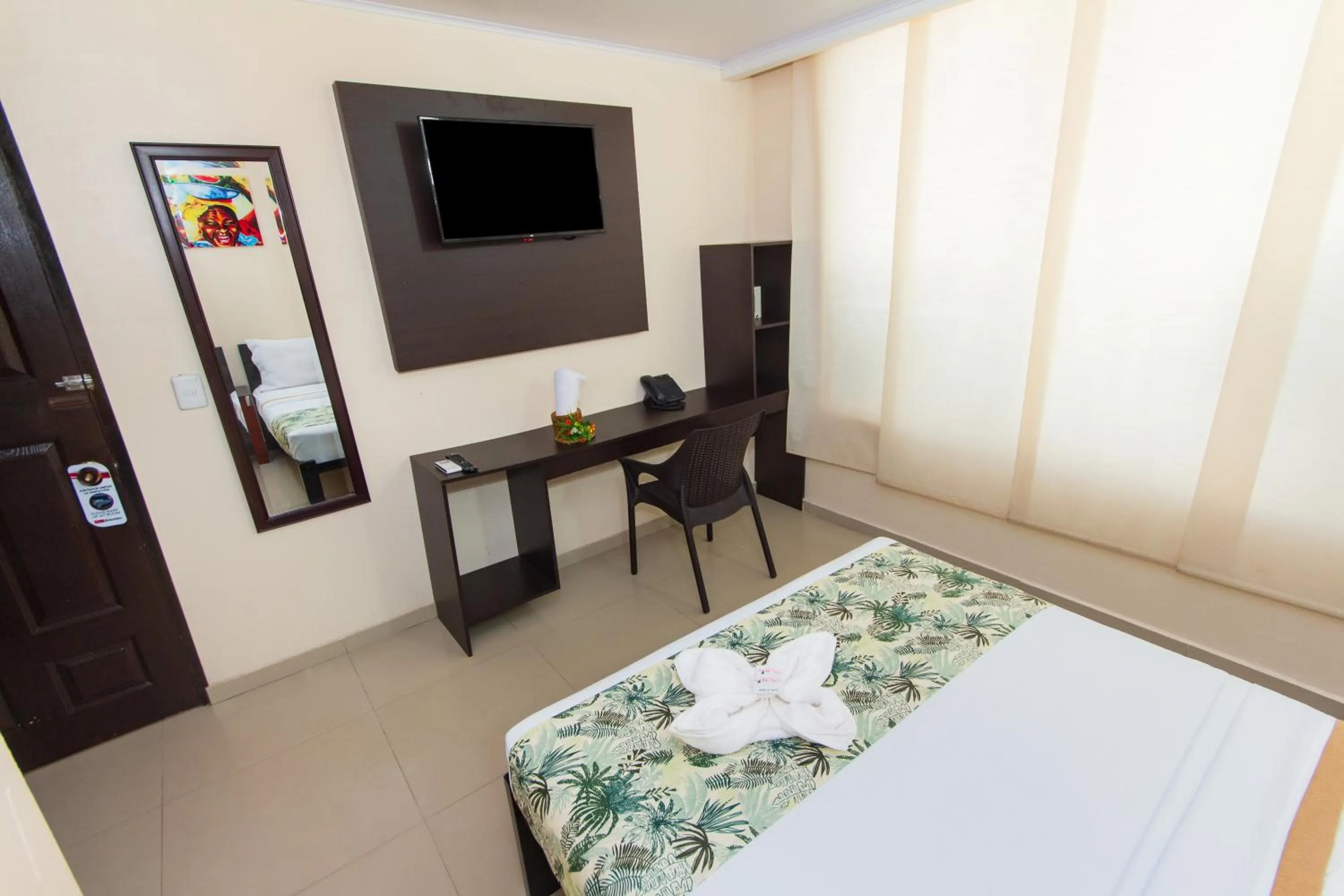 Bed in Hotel Marina Suites By GEH Suites