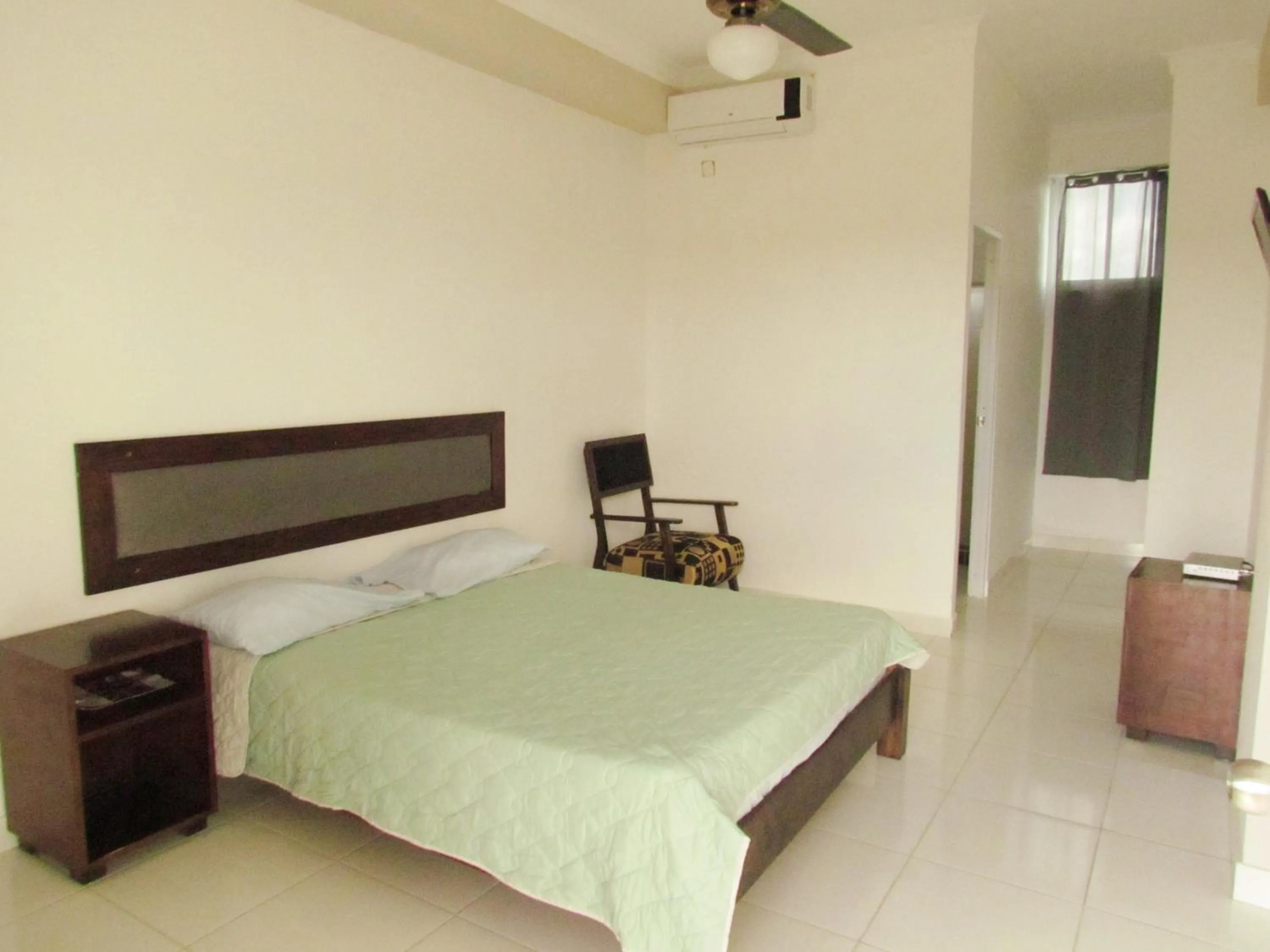 Photo of the whole room, Bed in Plaza Coral Hotel