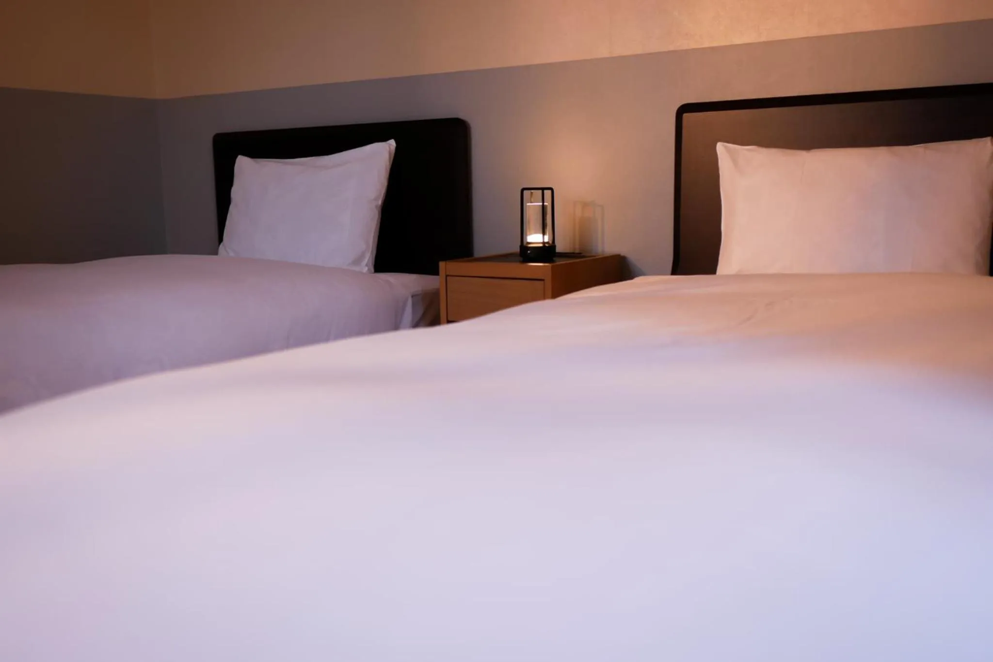 Bed in Kawaguchiko Country Cottage Ban