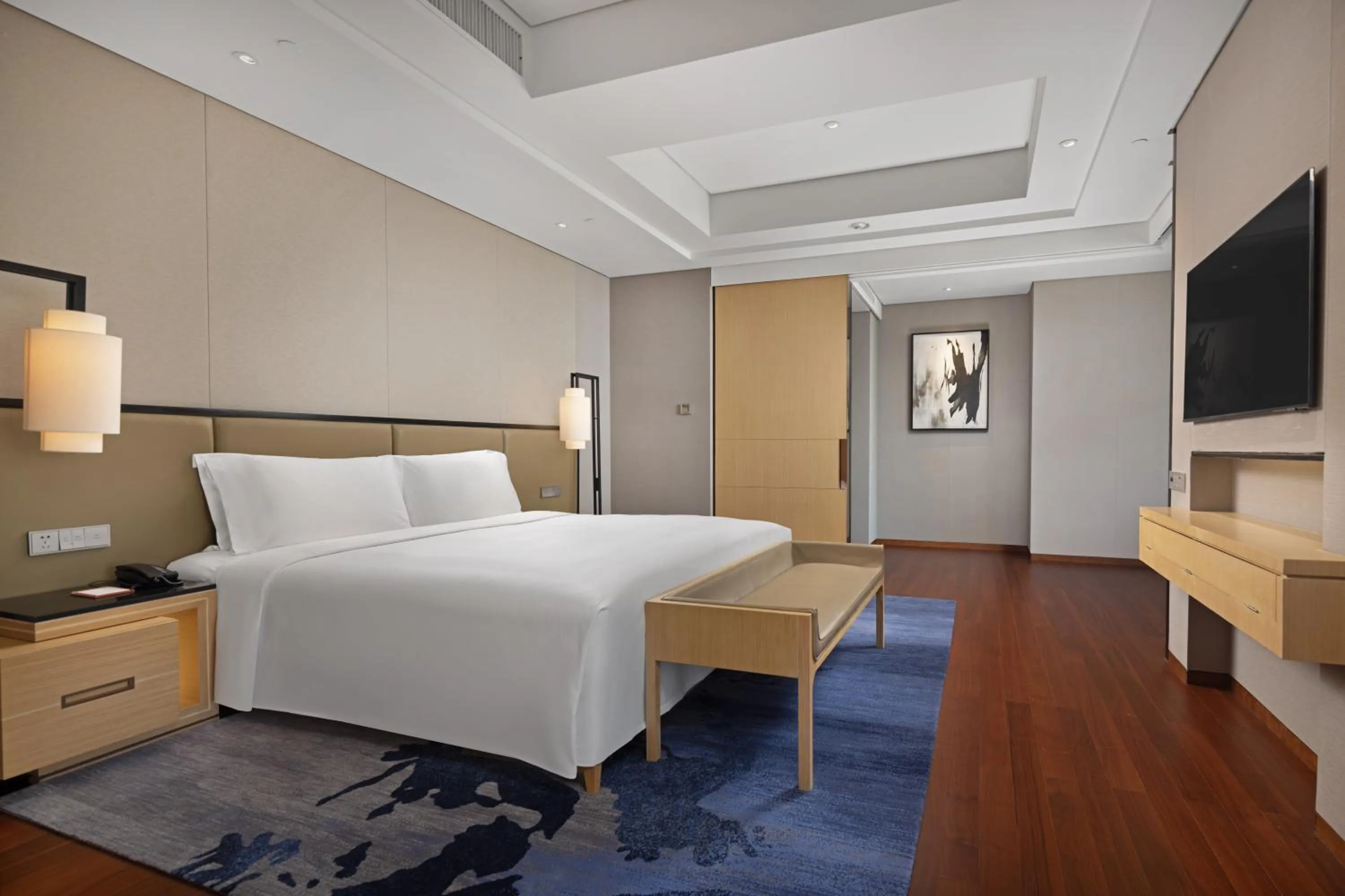 Bed in New World Beijing Hotel