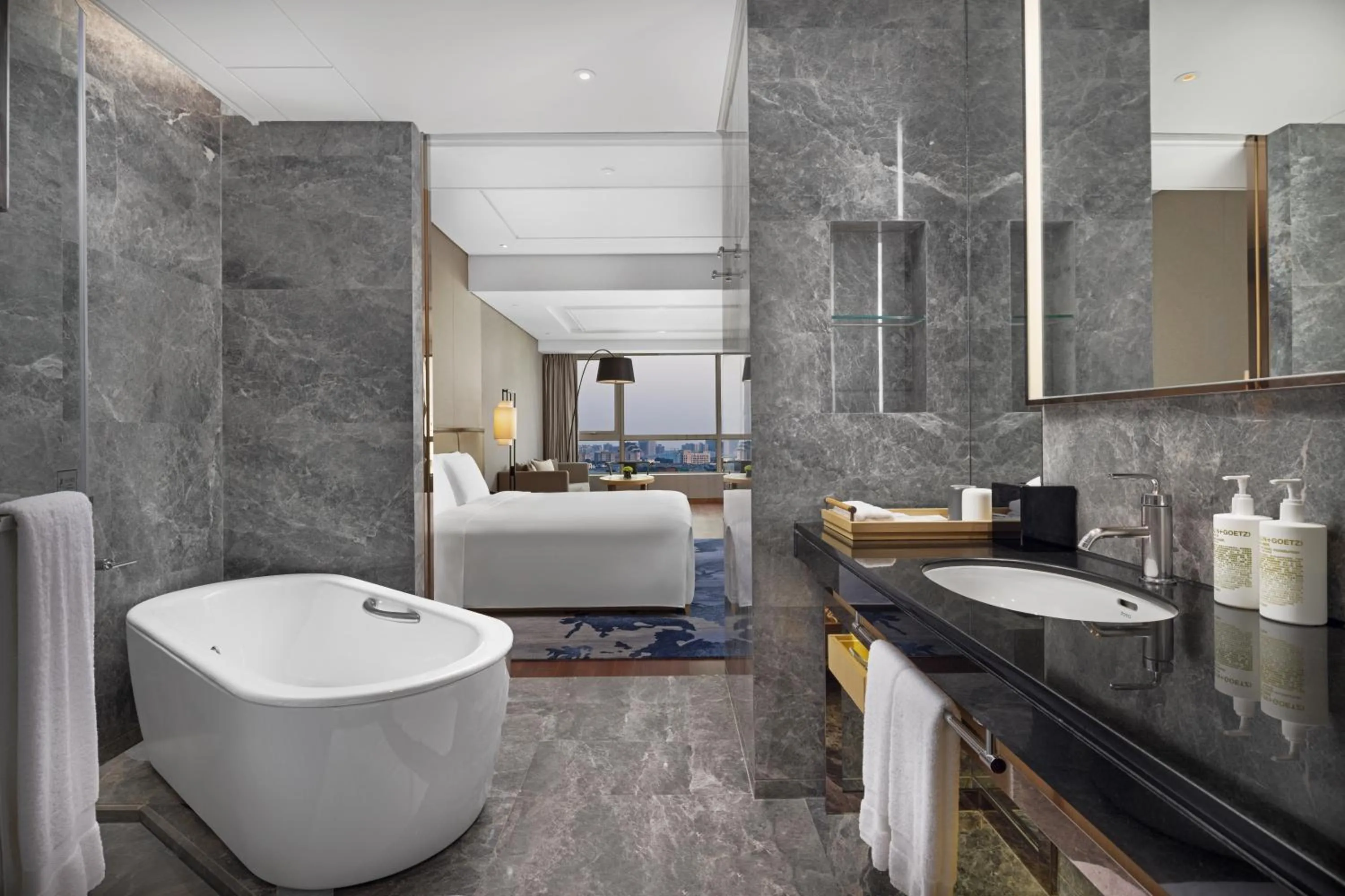 Bed in New World Beijing Hotel