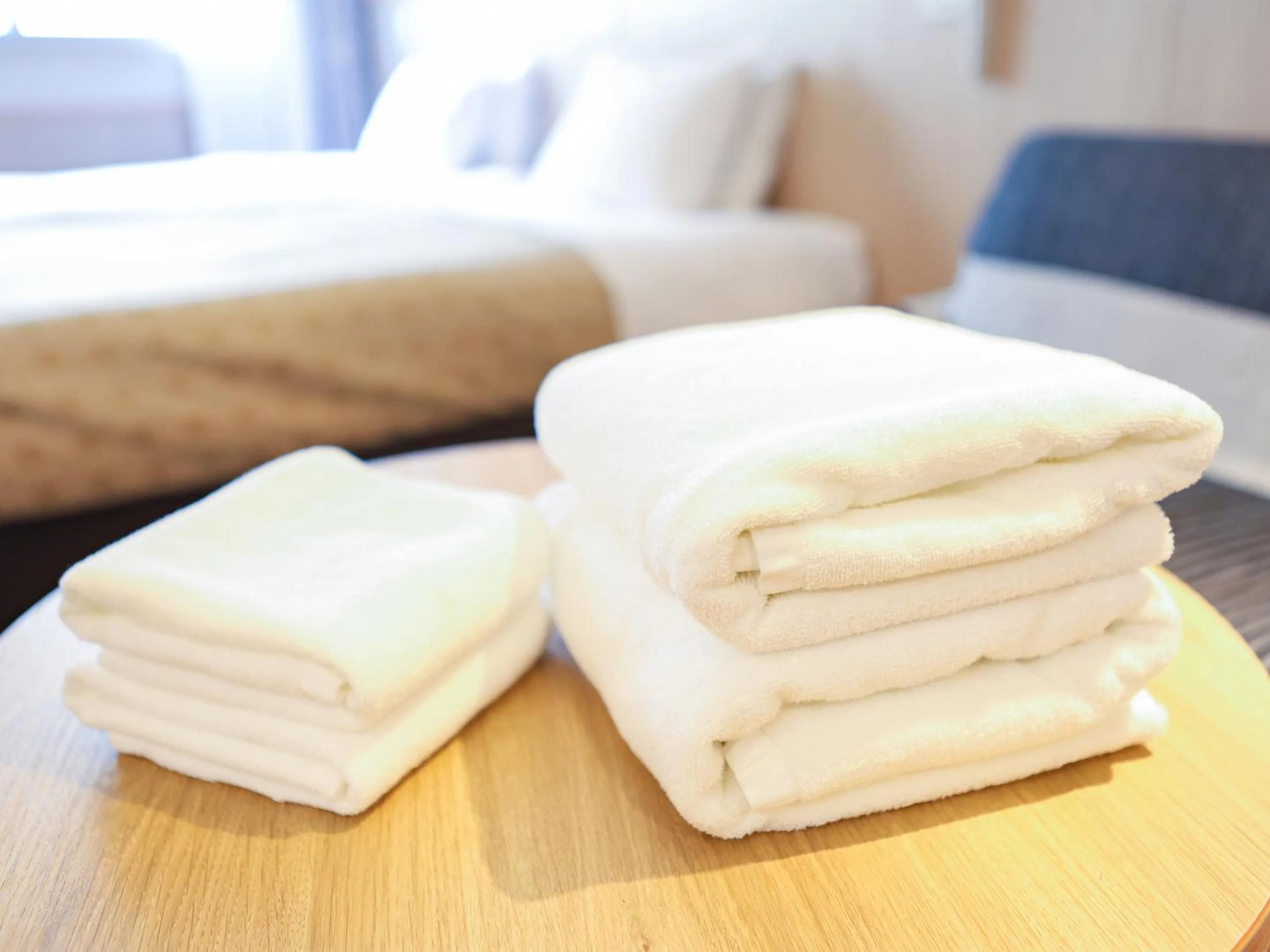towels, Bed in Fukui Hotel