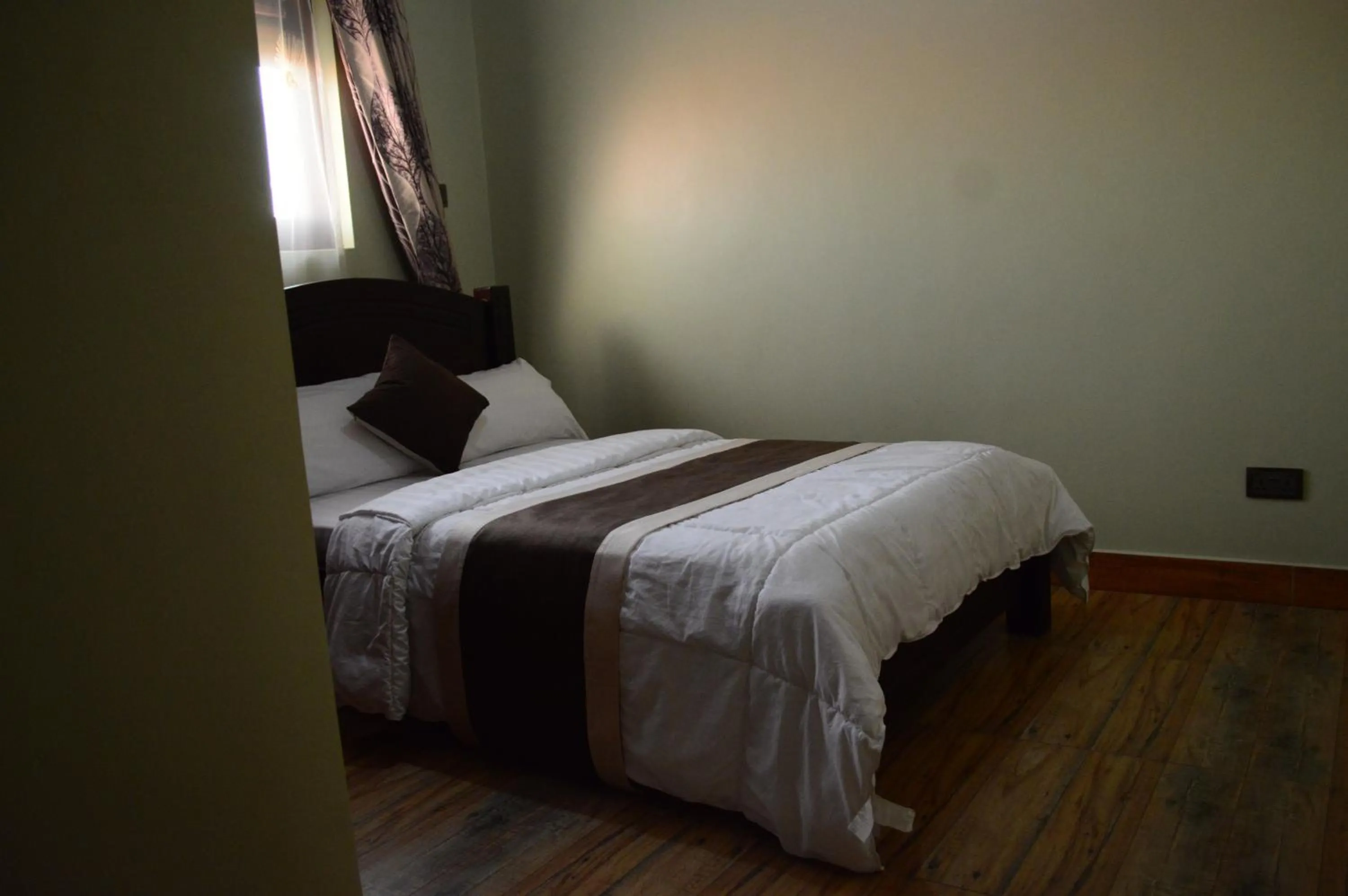 Bedroom, Bed in Munyonyo Heights Apartments