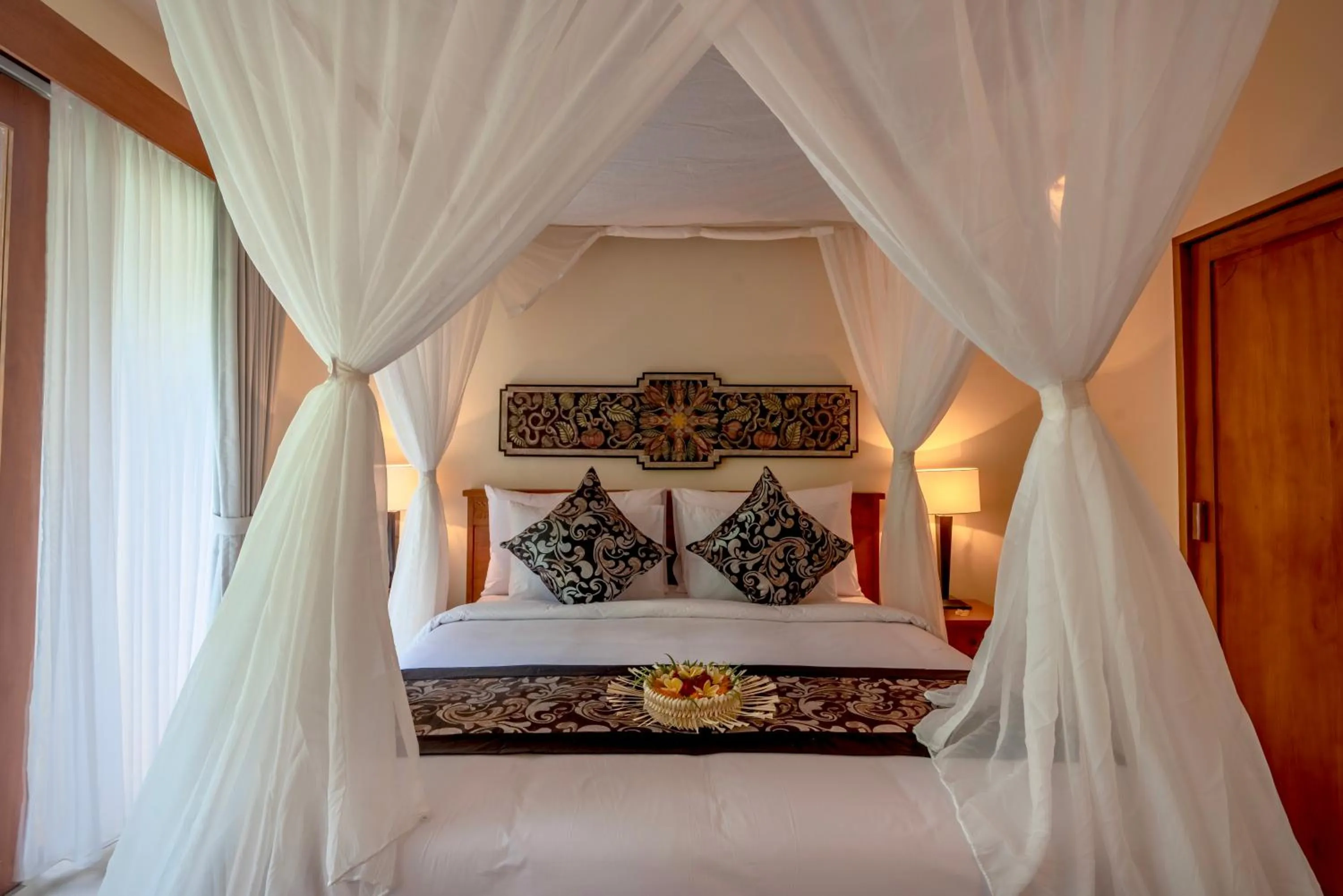 Bed in The Compass Rose Ubud