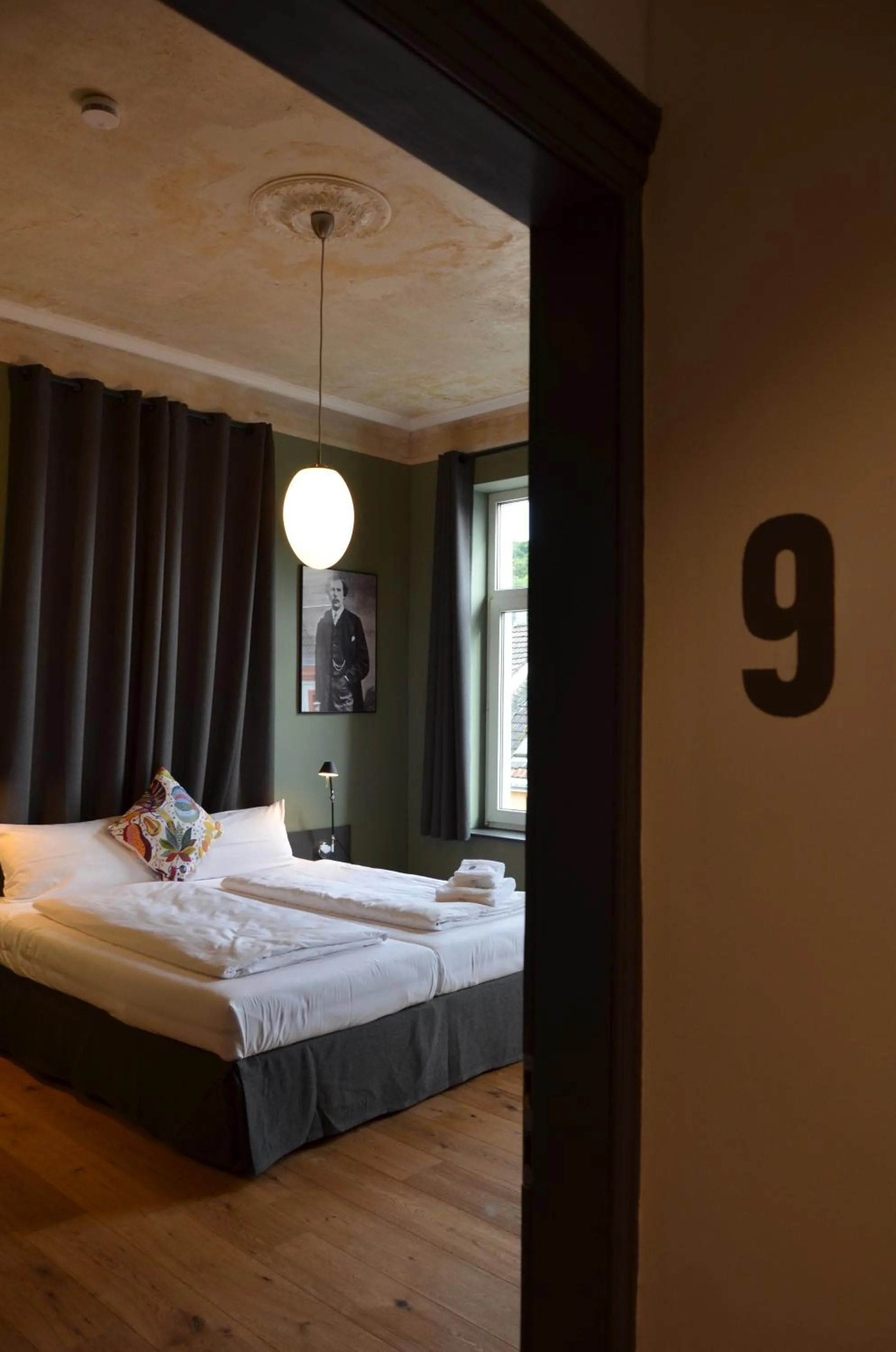 Bed in Storyhotel Bergischer Hof Königswinter