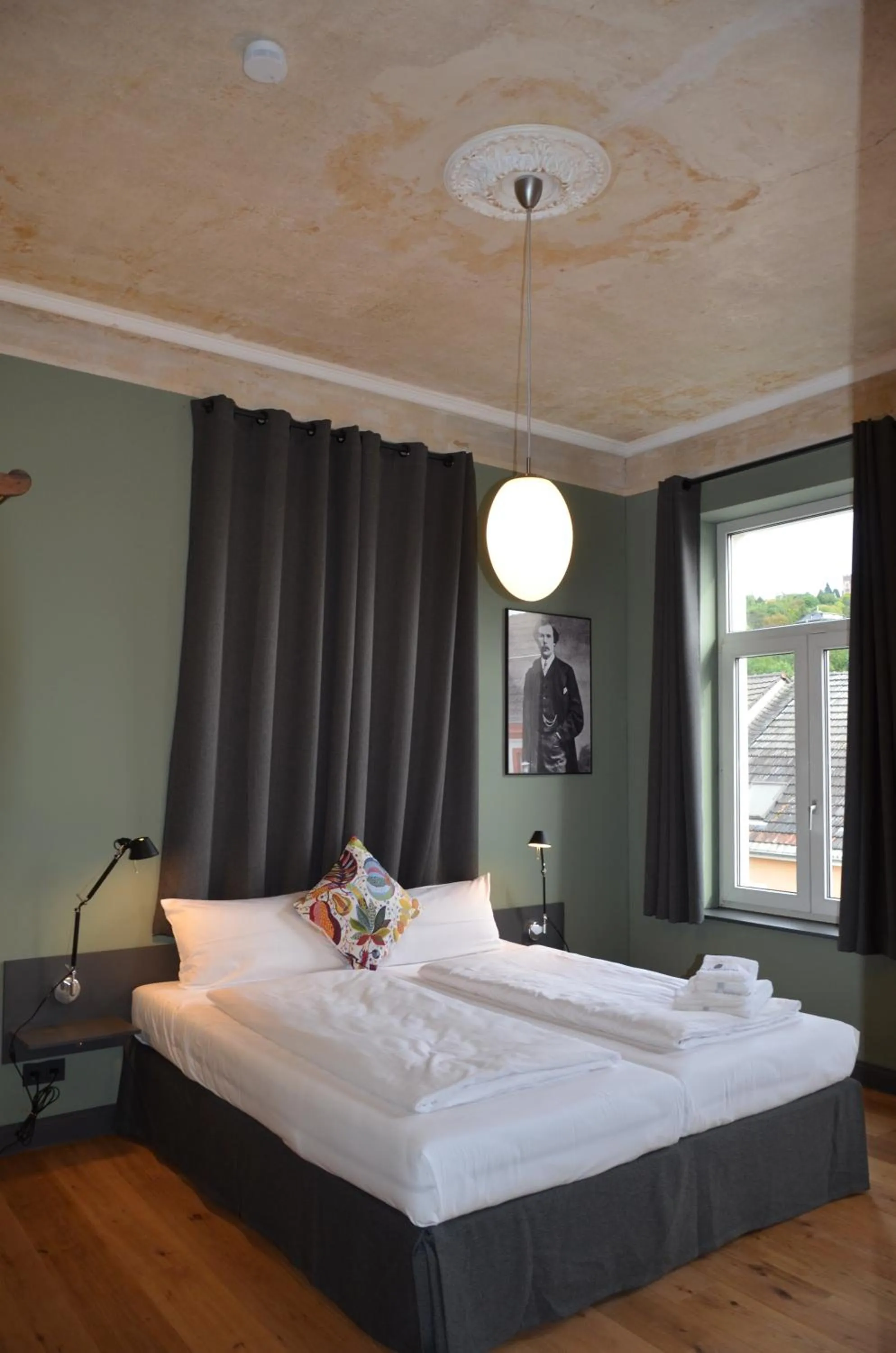 Bed in Storyhotel Bergischer Hof Königswinter