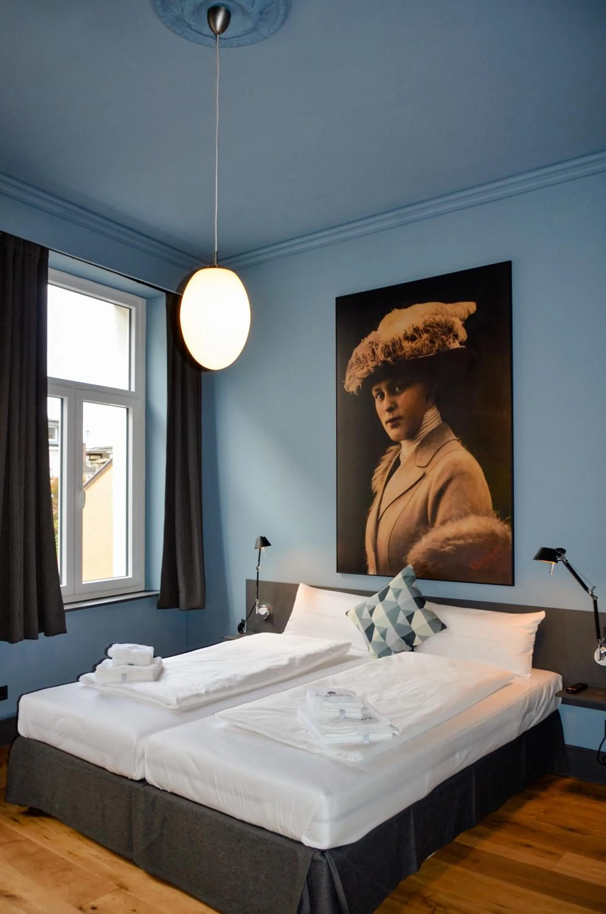 Bed in Storyhotel Bergischer Hof Königswinter