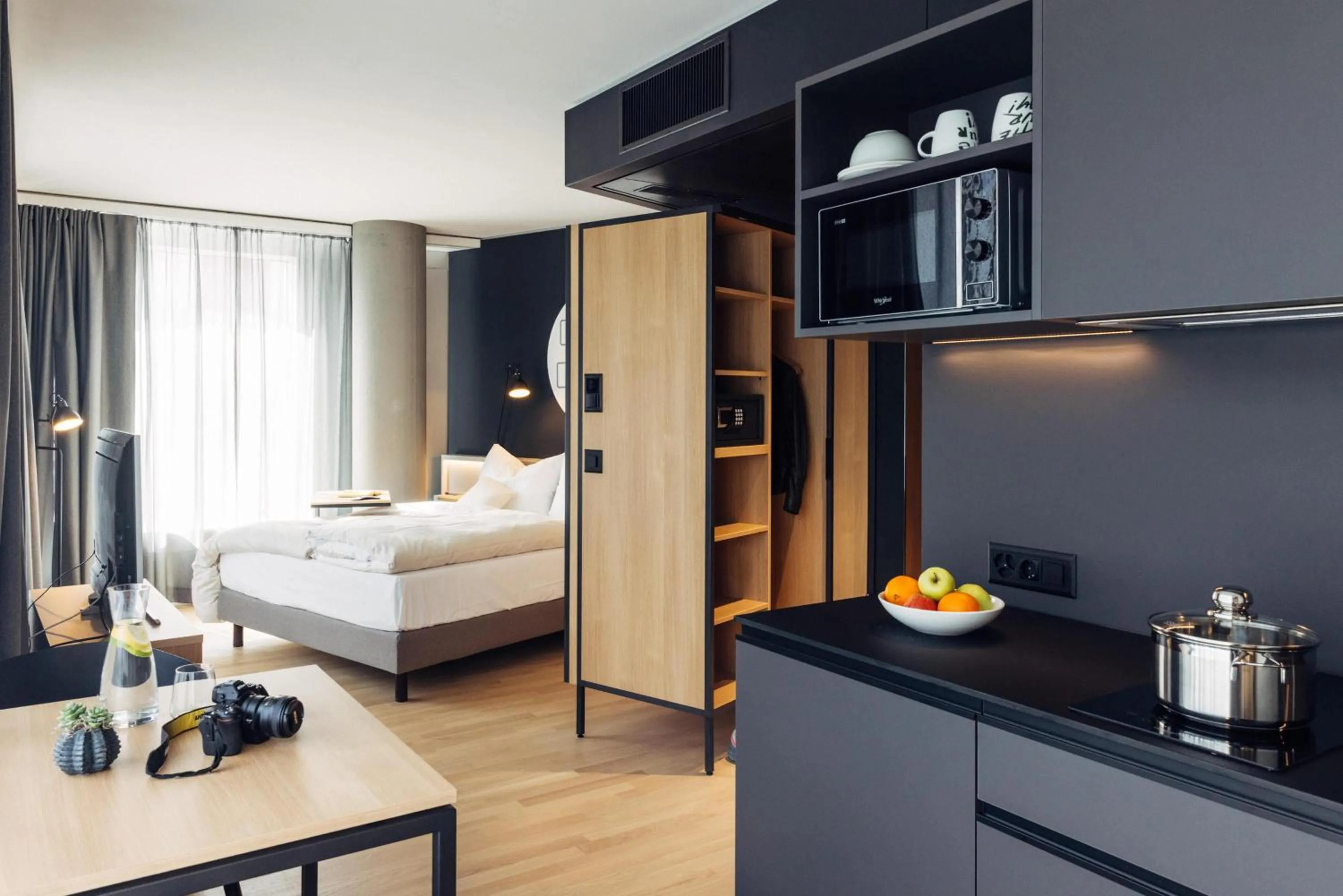 Photo of the whole room, Bed in harry's home Bern-Expo