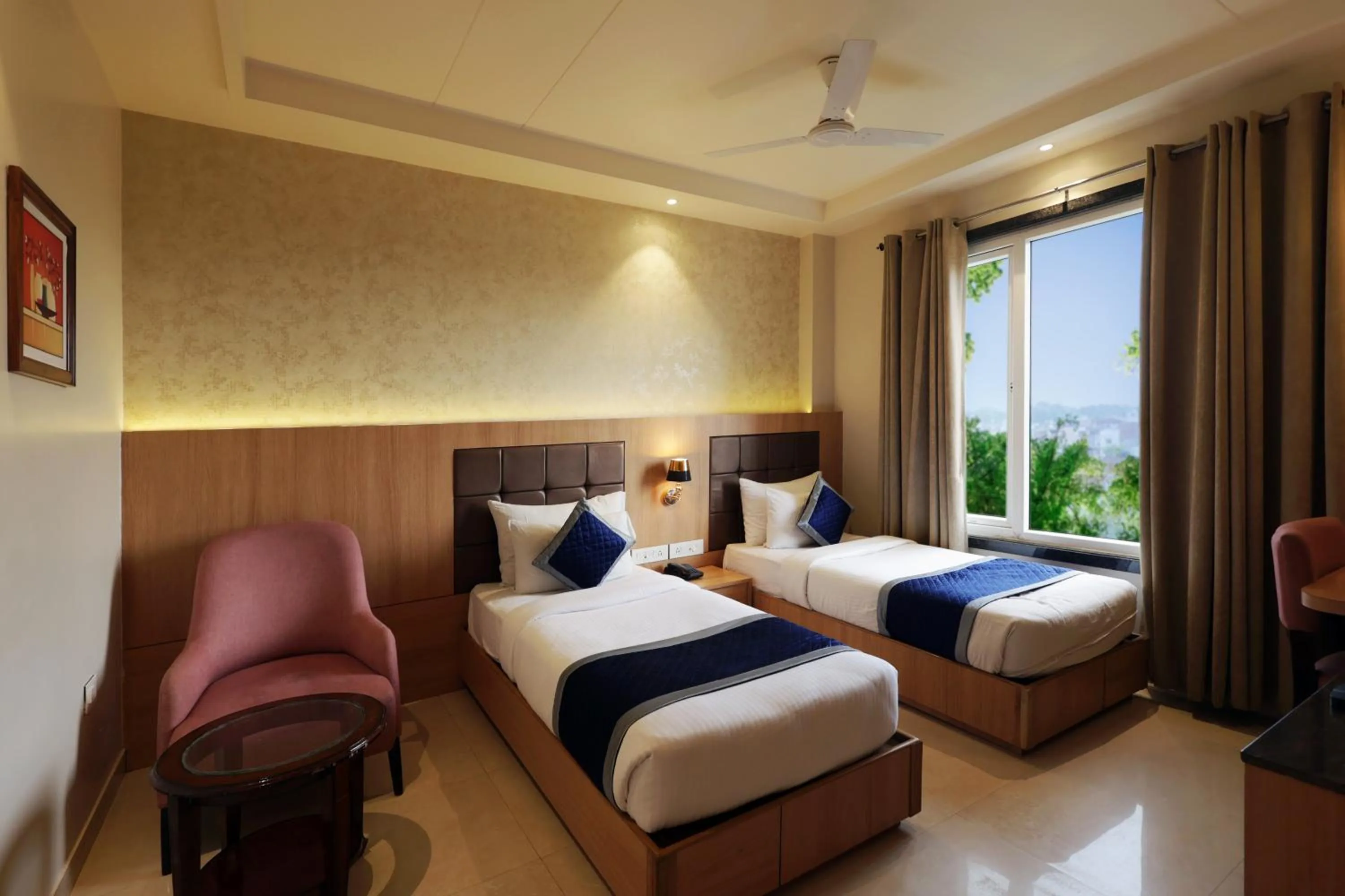 Bed in The Elegance Hotel