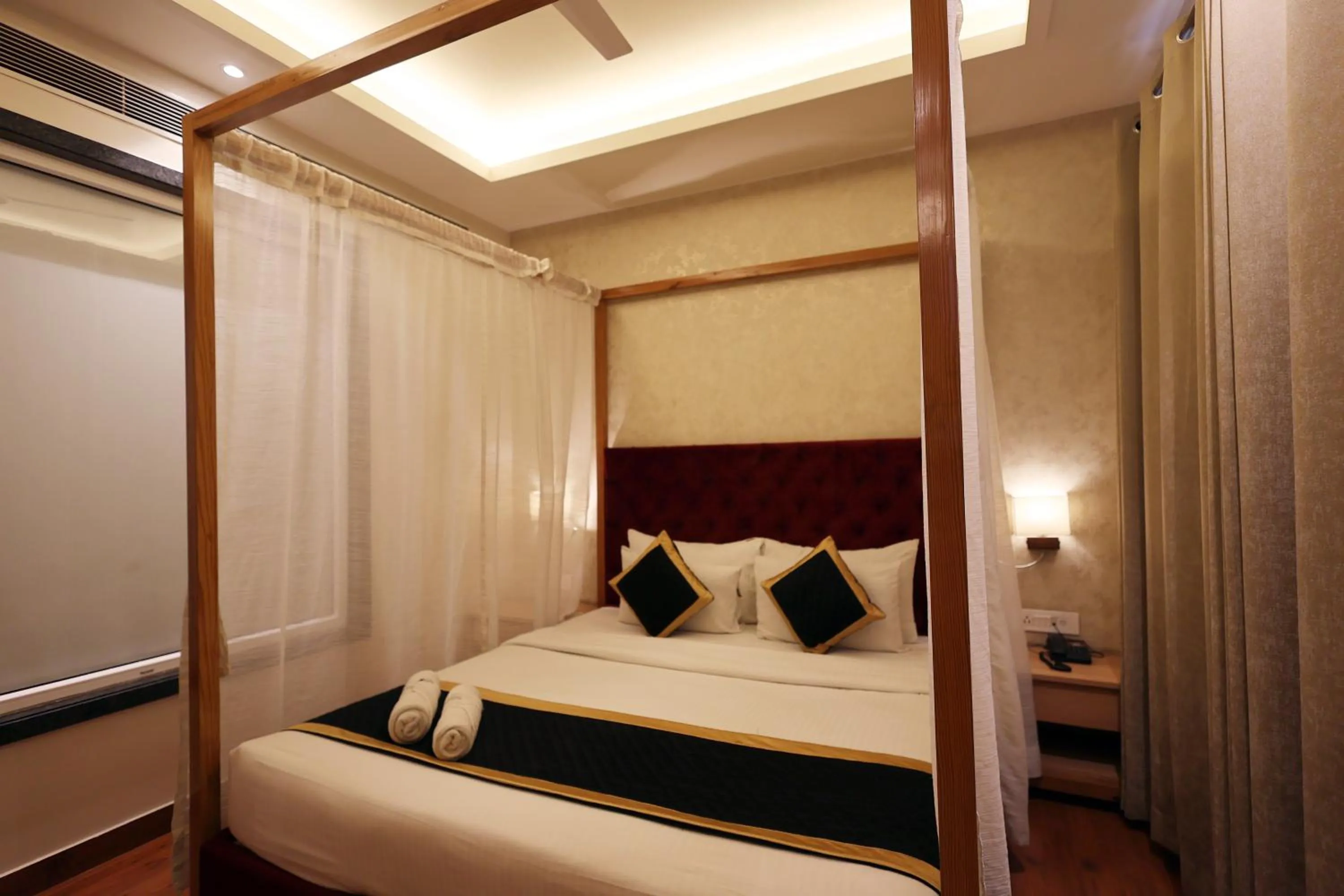 Bed in The Elegance Hotel