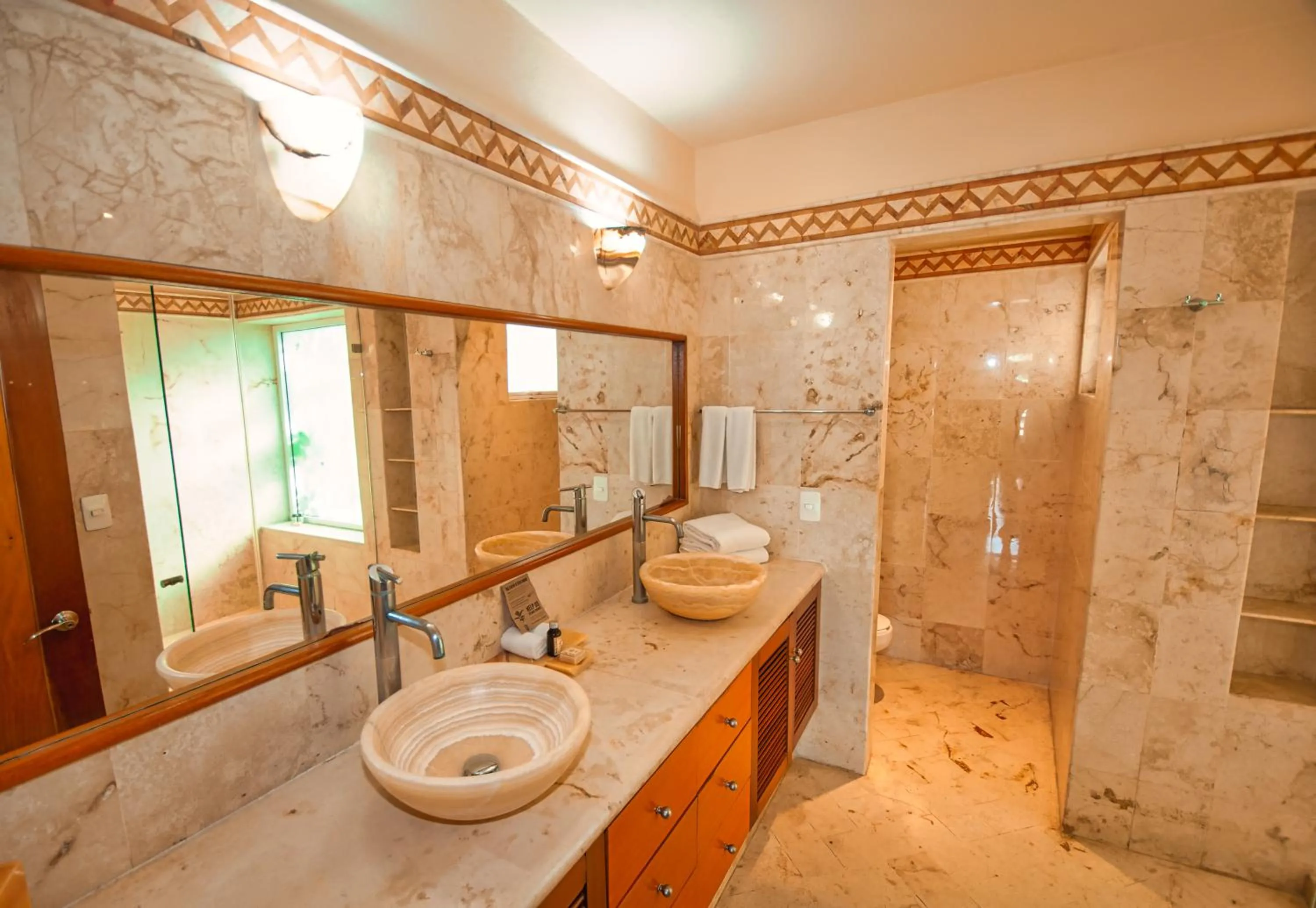 Toilet in Porto Playa Condo Hotel and Beach Club