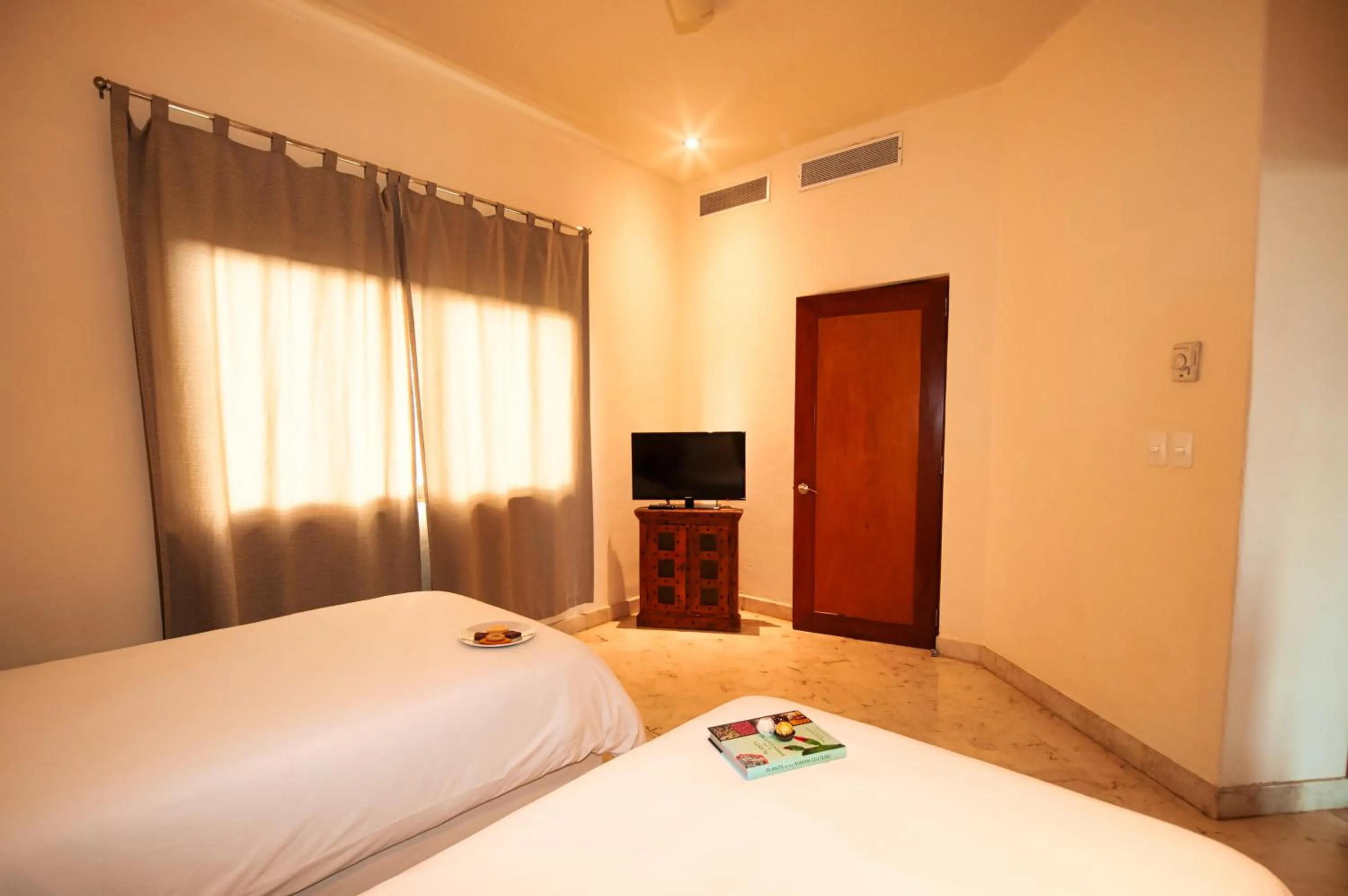 Bed in Porto Playa Condo Hotel and Beach Club