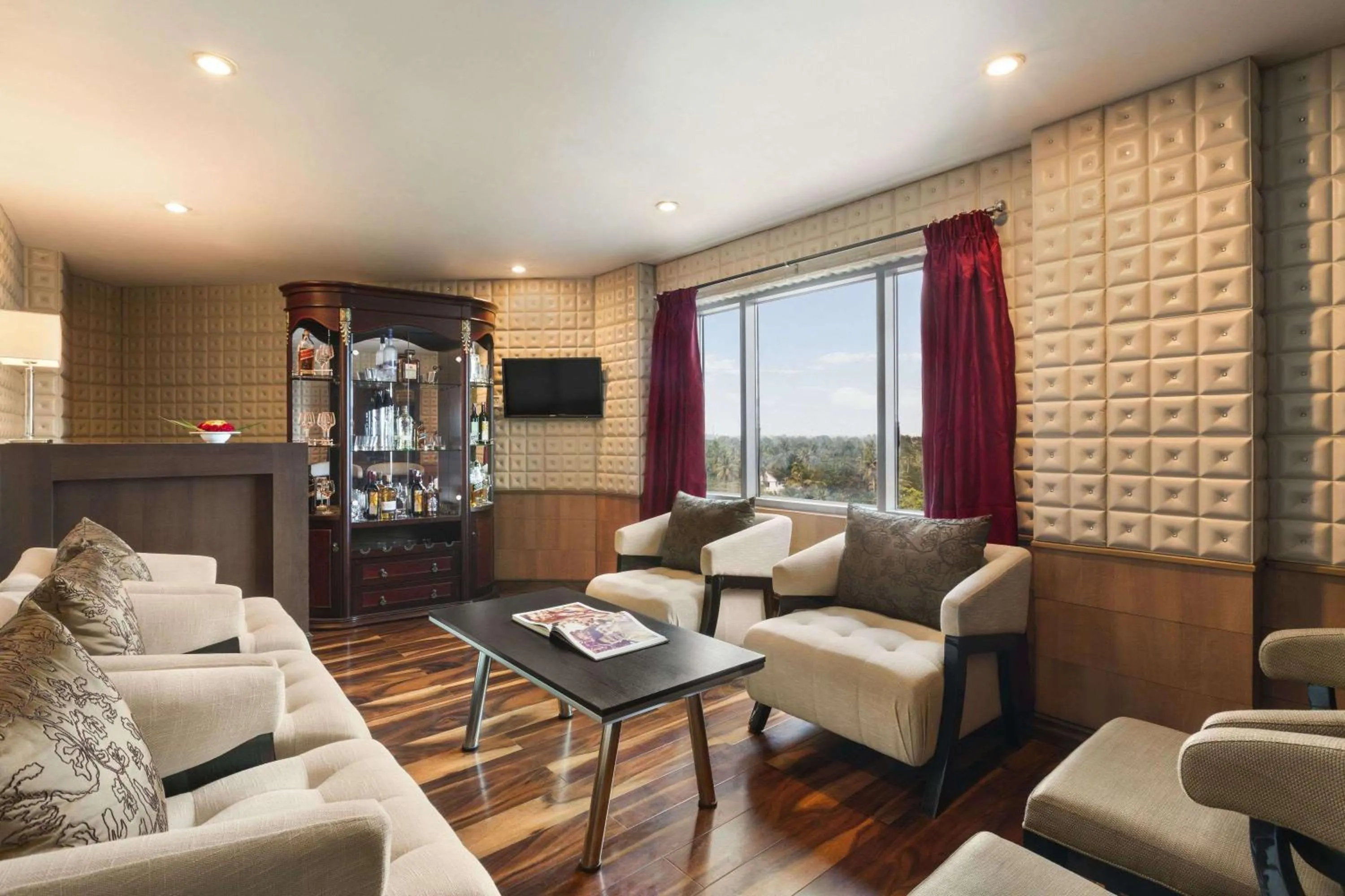 Lounge or bar in Ramada by Wyndham Alleppey