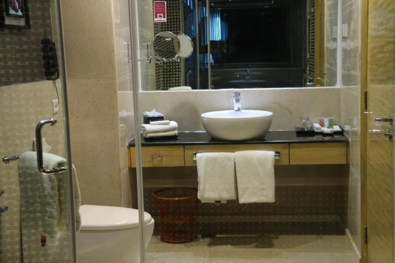Bathroom in Ramada by Wyndham Alleppey