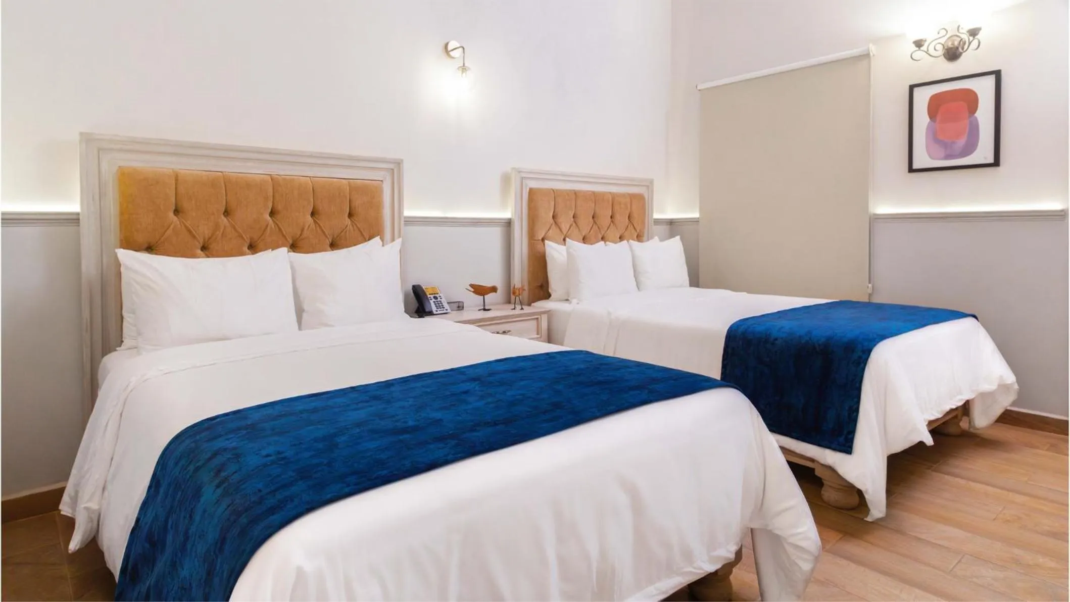 Photo of the whole room, Bed in voco Royalty Puebla Downtown by IHG