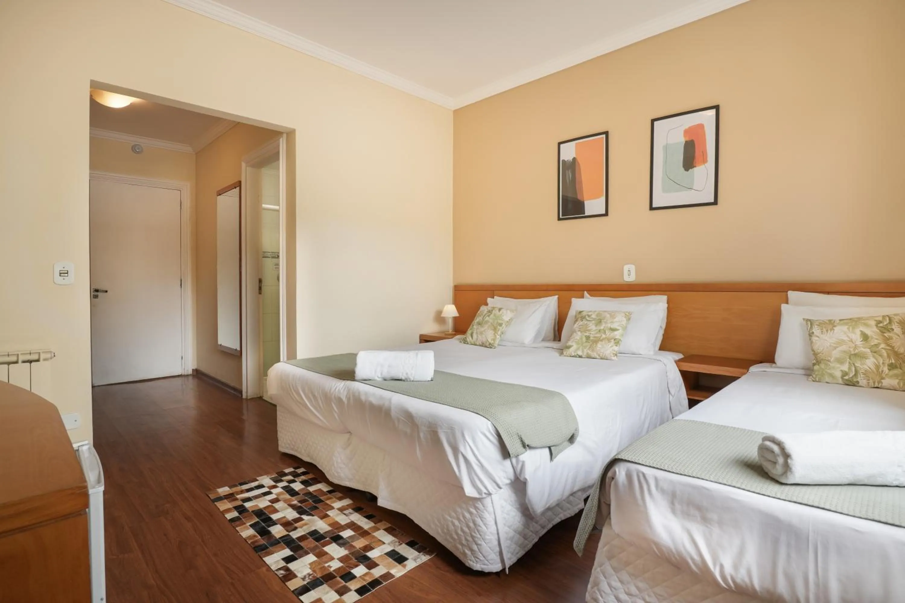 Bed in Pousada Parque das Flores