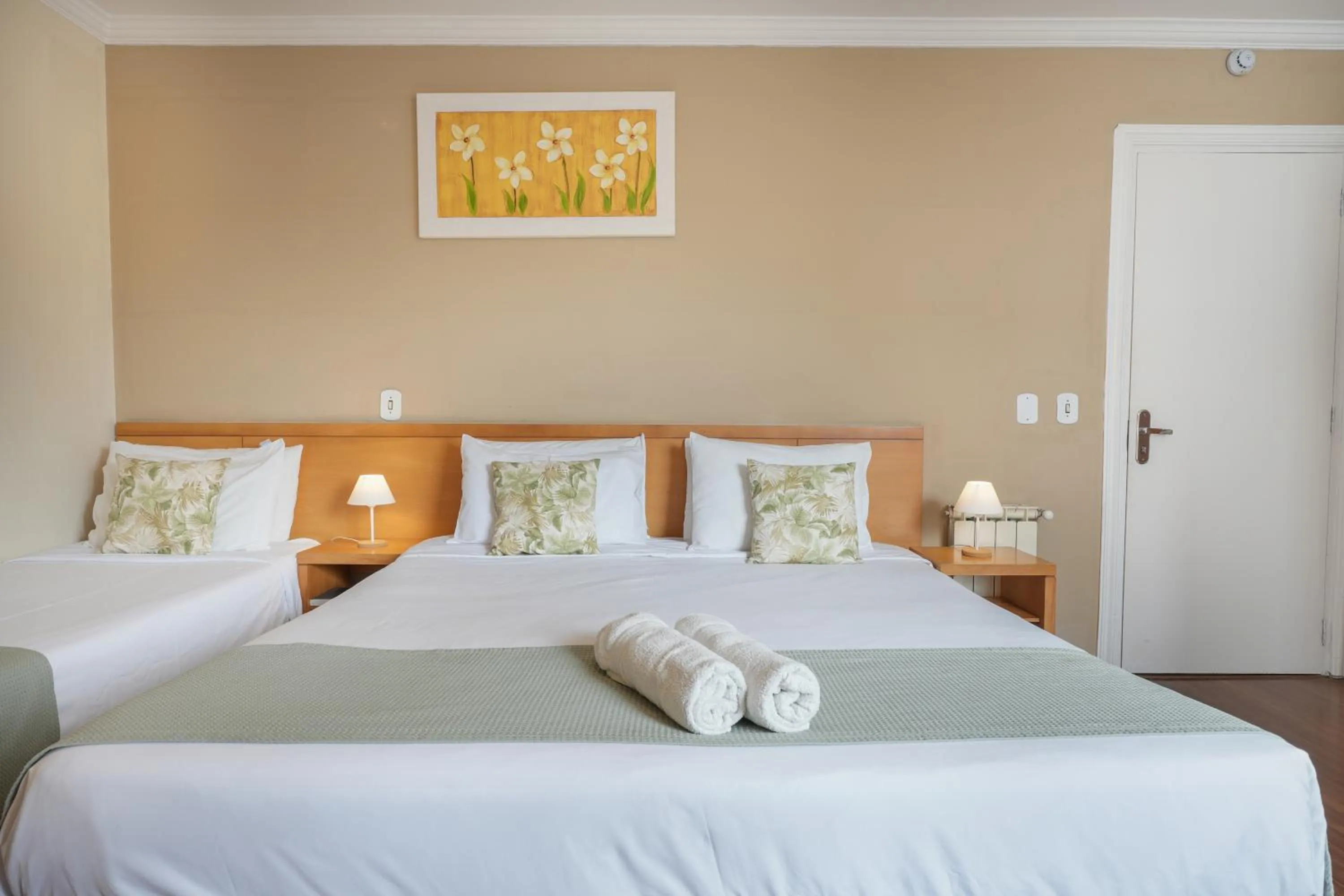 Bed in Pousada Parque das Flores