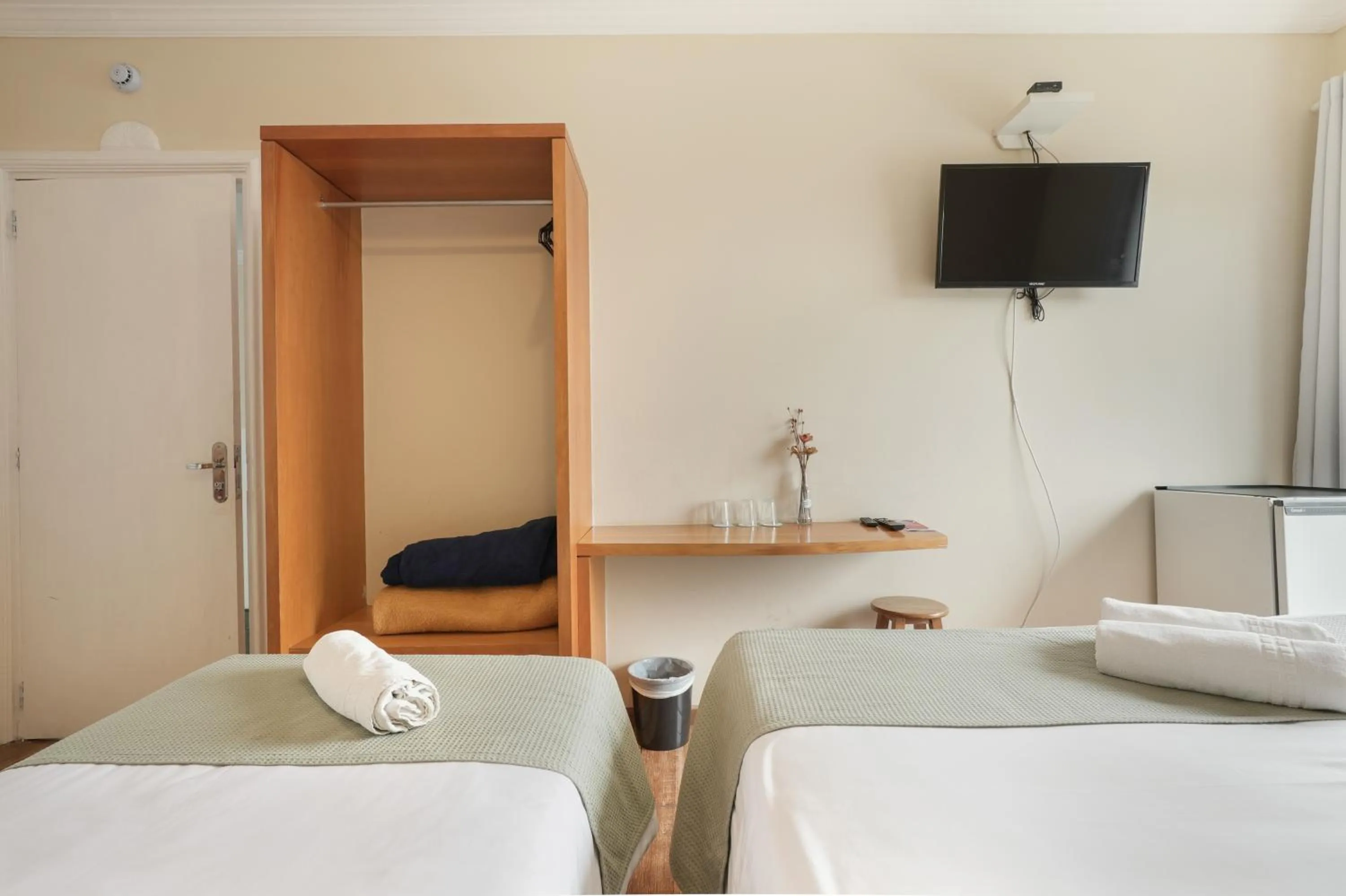 Bed in Pousada Parque das Flores