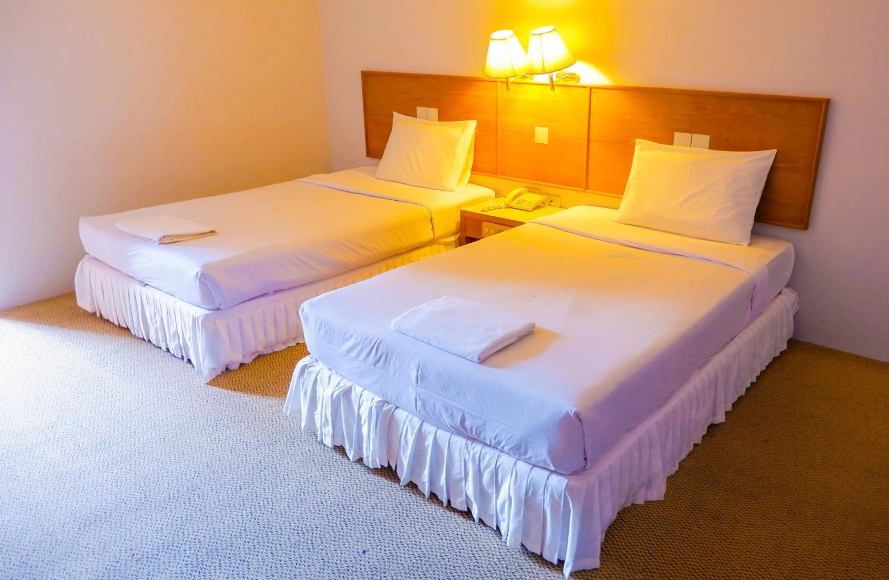 Bed in Sweet Home Hotel Betong