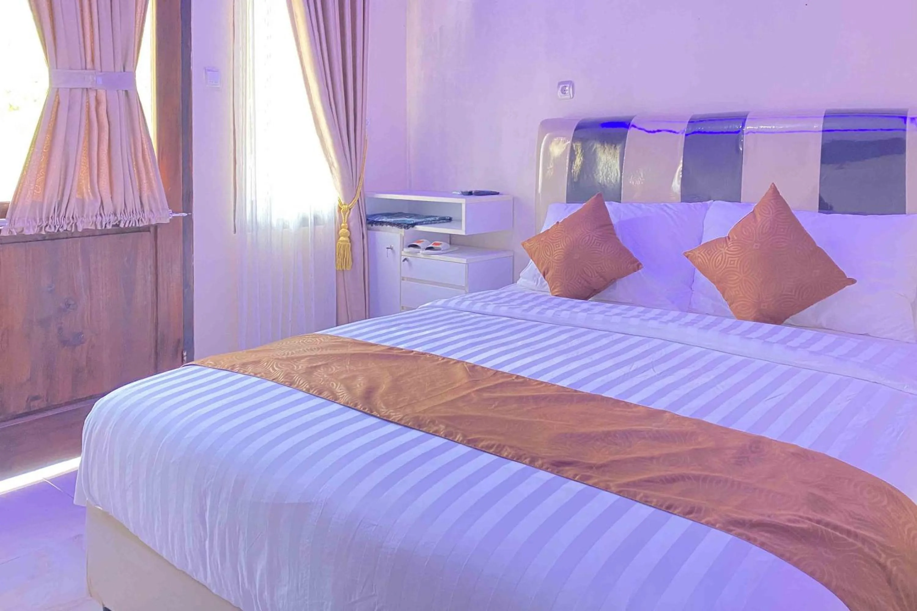 Bed in Homestay Banteng Adventure Dieng Mitra RedDoorz