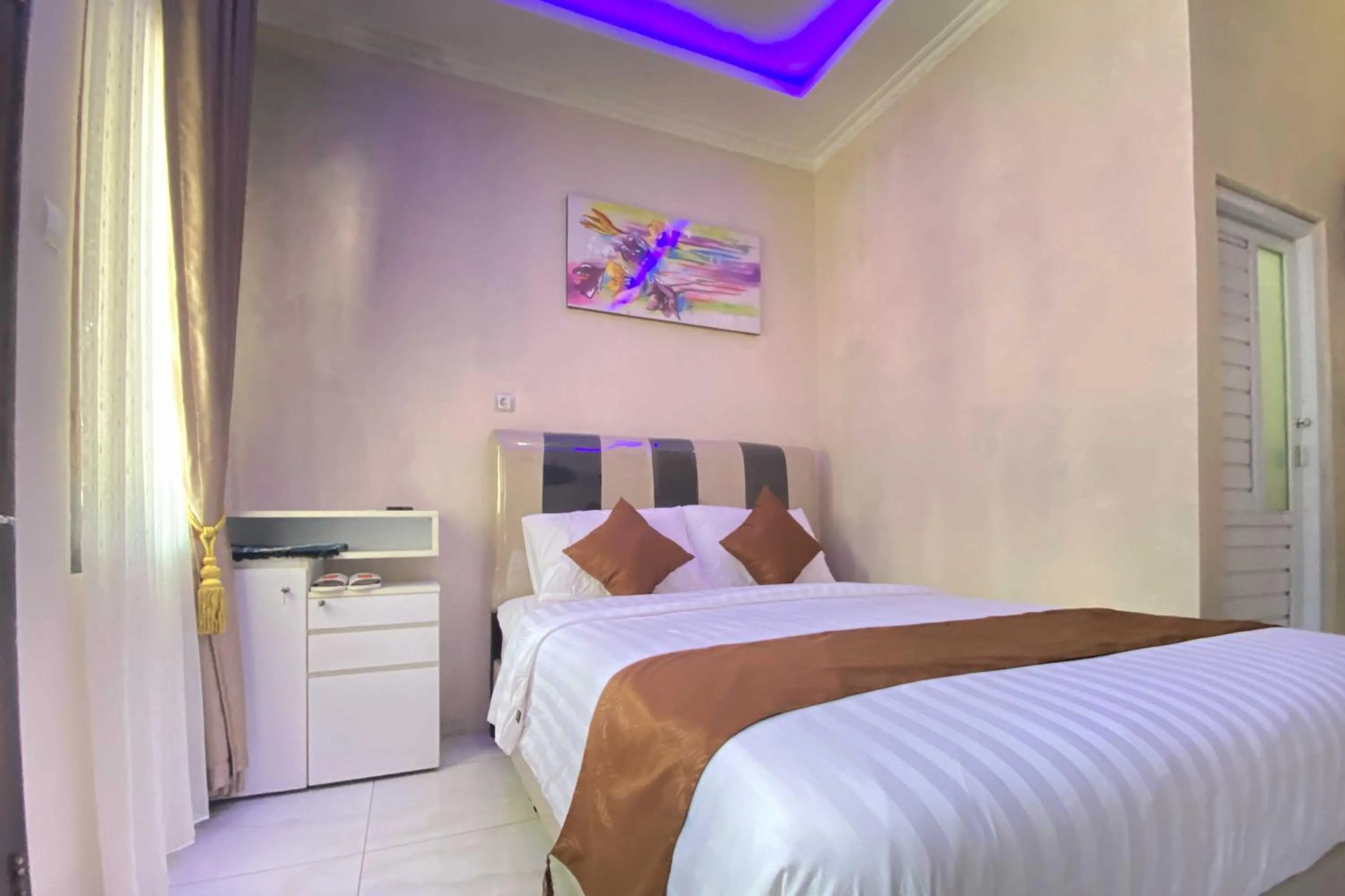 Bed in Homestay Banteng Adventure Dieng Mitra RedDoorz