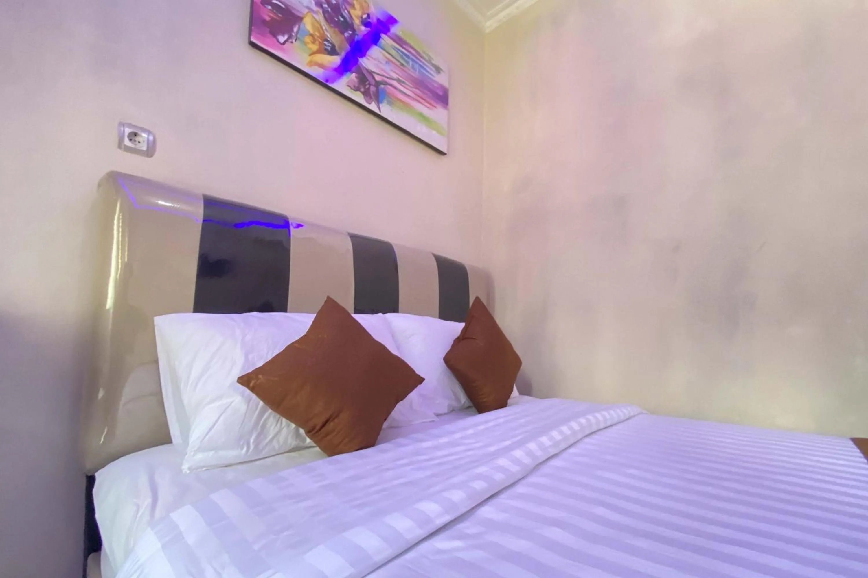 Bed in Homestay Banteng Adventure Dieng Mitra RedDoorz