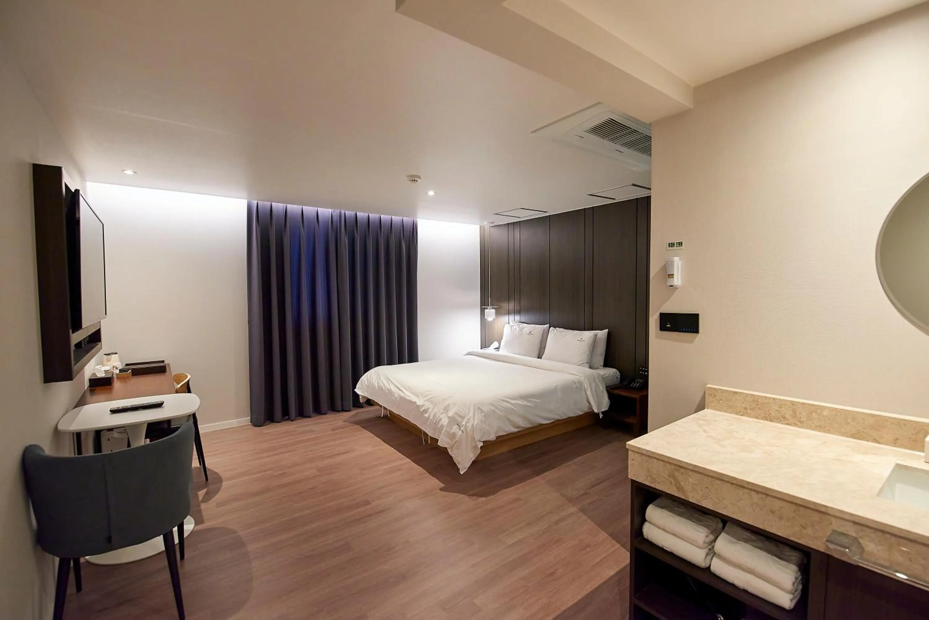 Bed in BONATHREE HOTEL