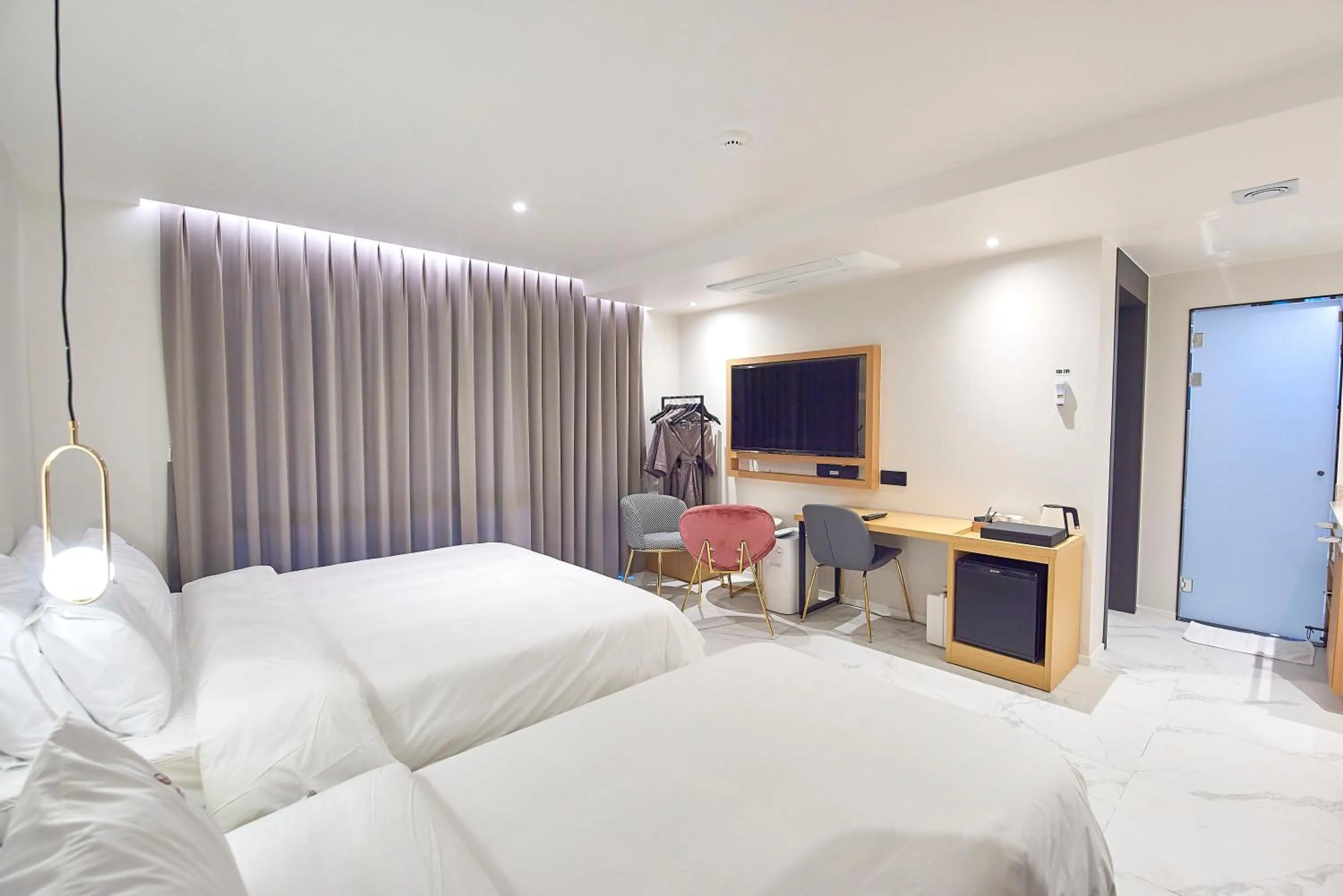 Bed in BONATHREE HOTEL