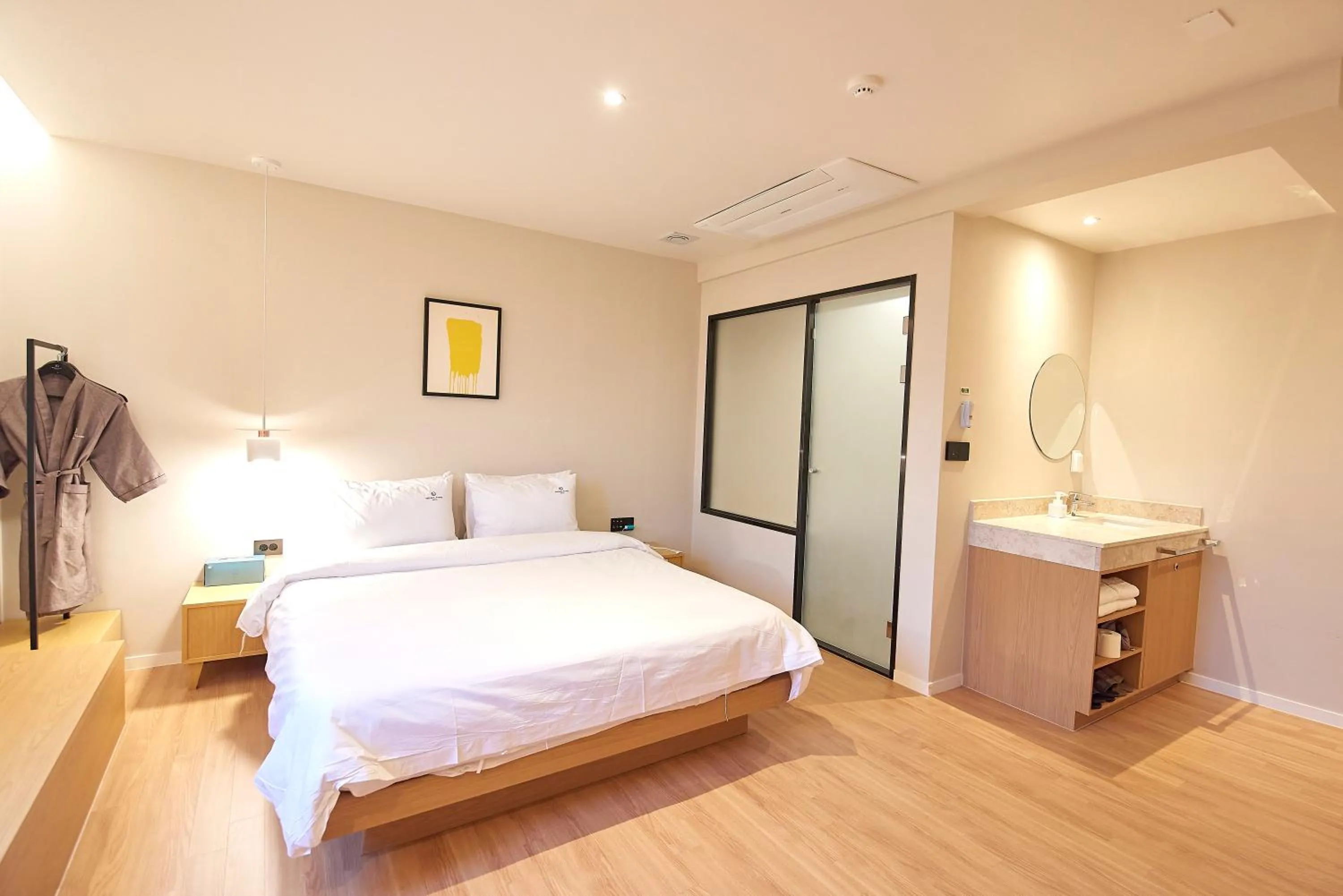 Bed in BONATHREE HOTEL