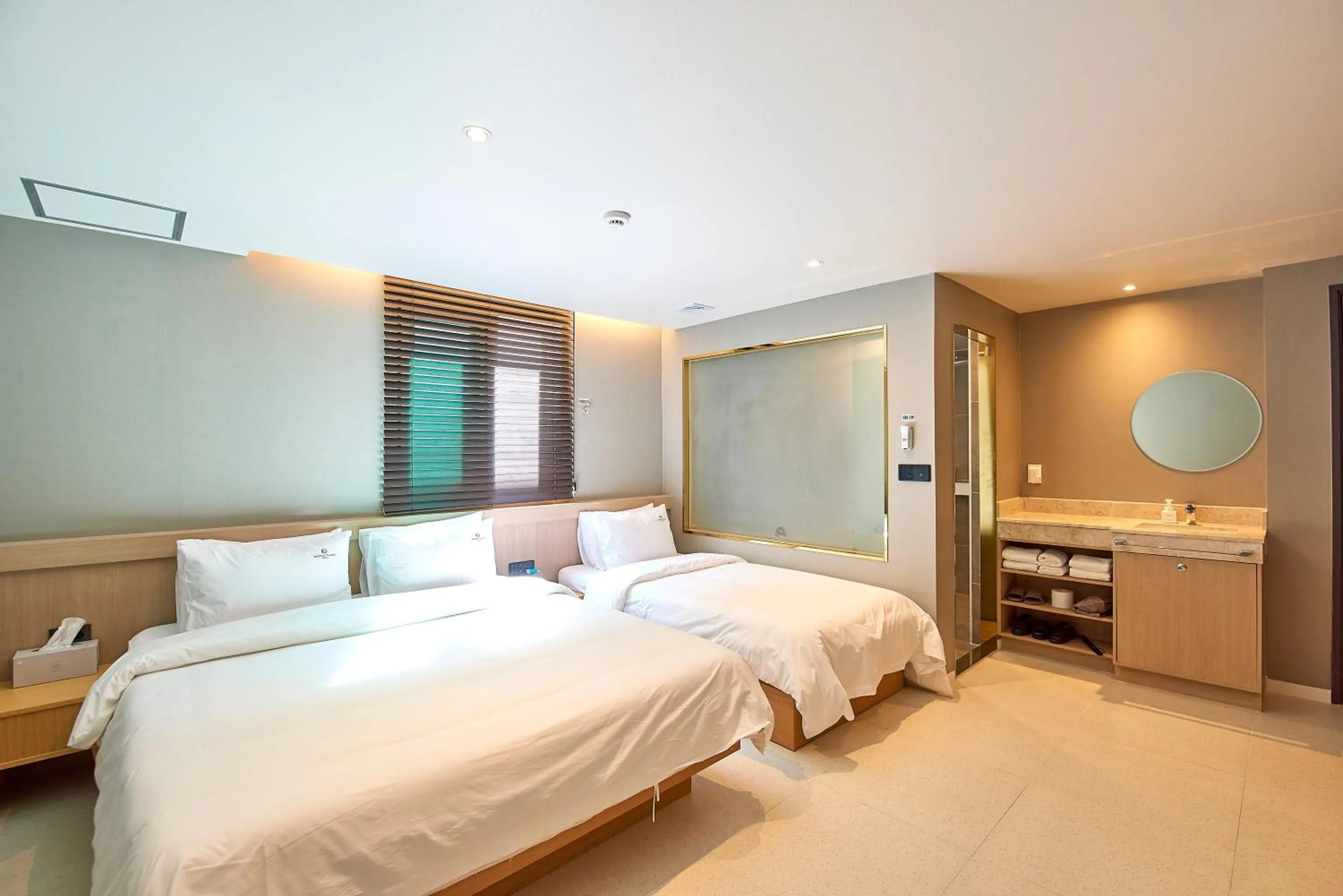 Bed in BONATHREE HOTEL