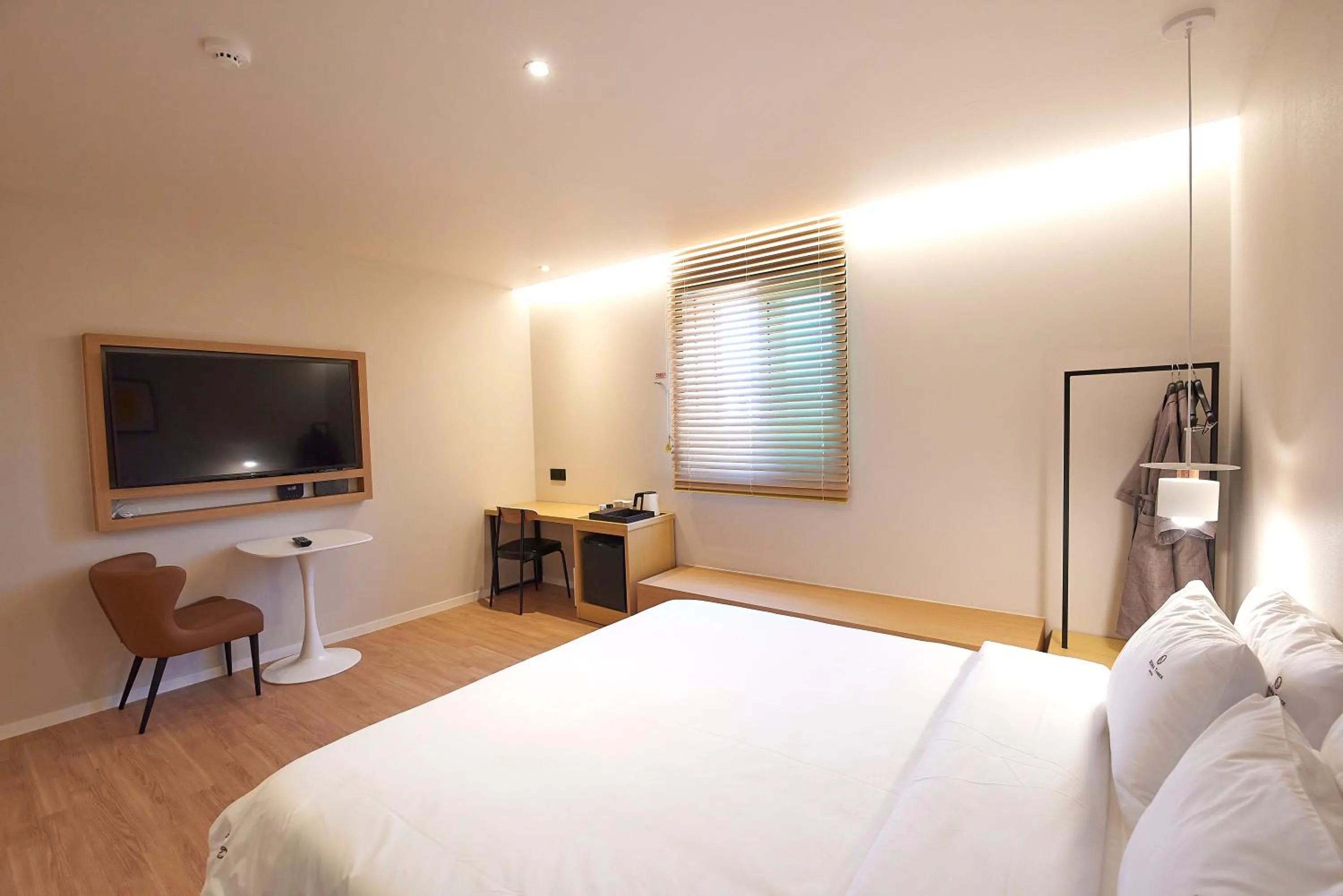 Bed in BONATHREE HOTEL