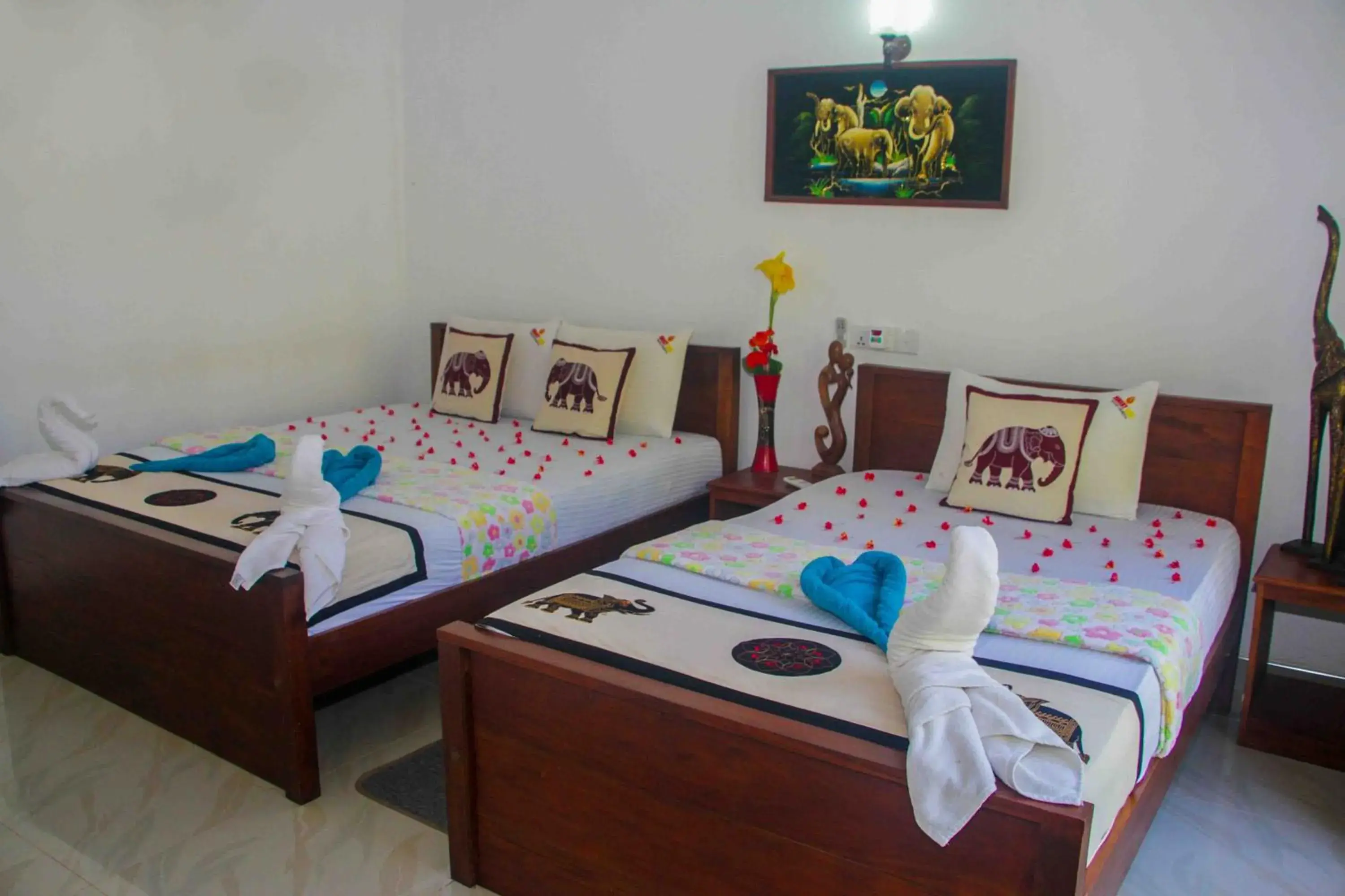 Deluxe Triple Room in Hungry Lion Sigiriya Deluxe Triple Room in Hungry Lion Sigiriya