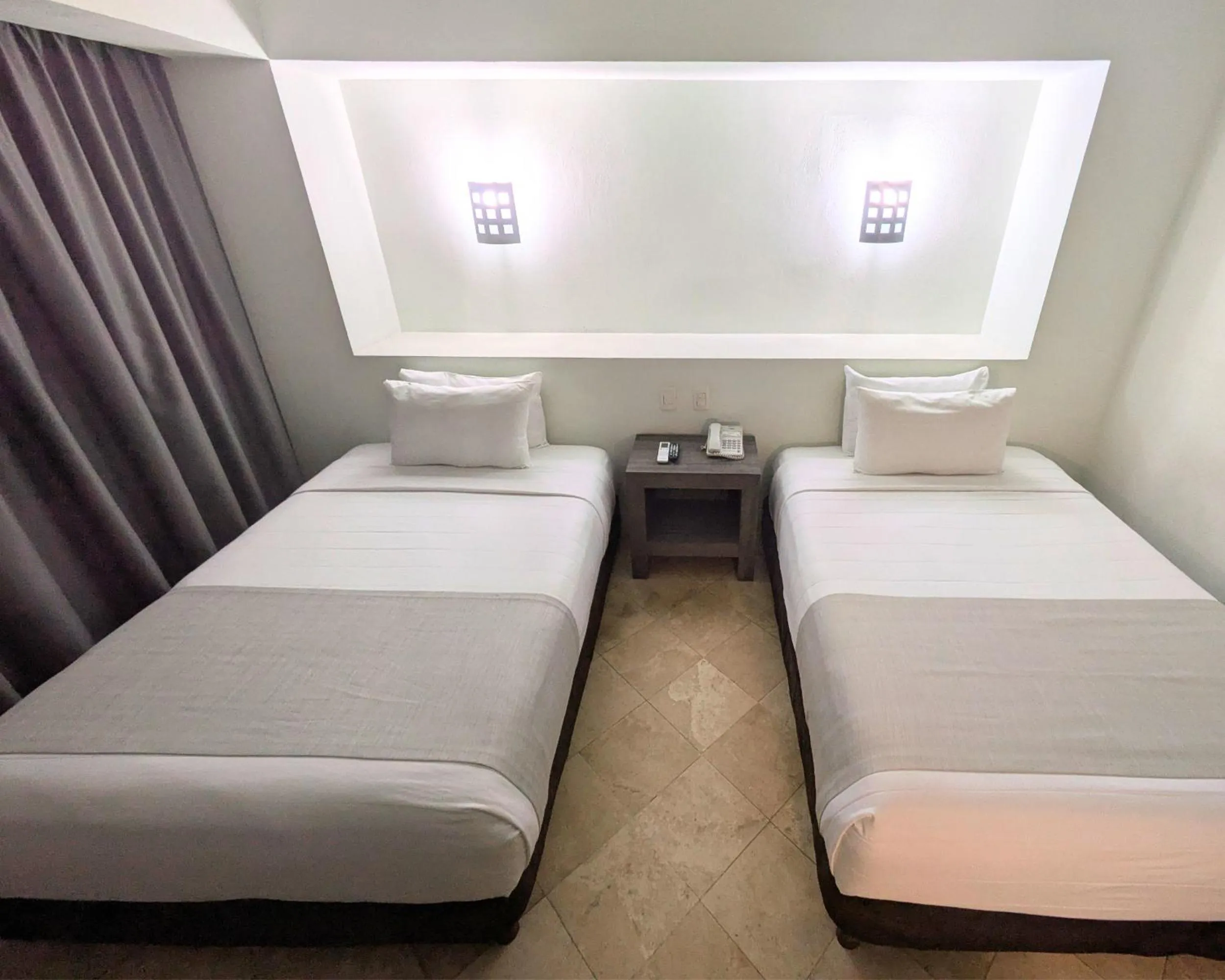 Bed in We Hotel Aeropuerto