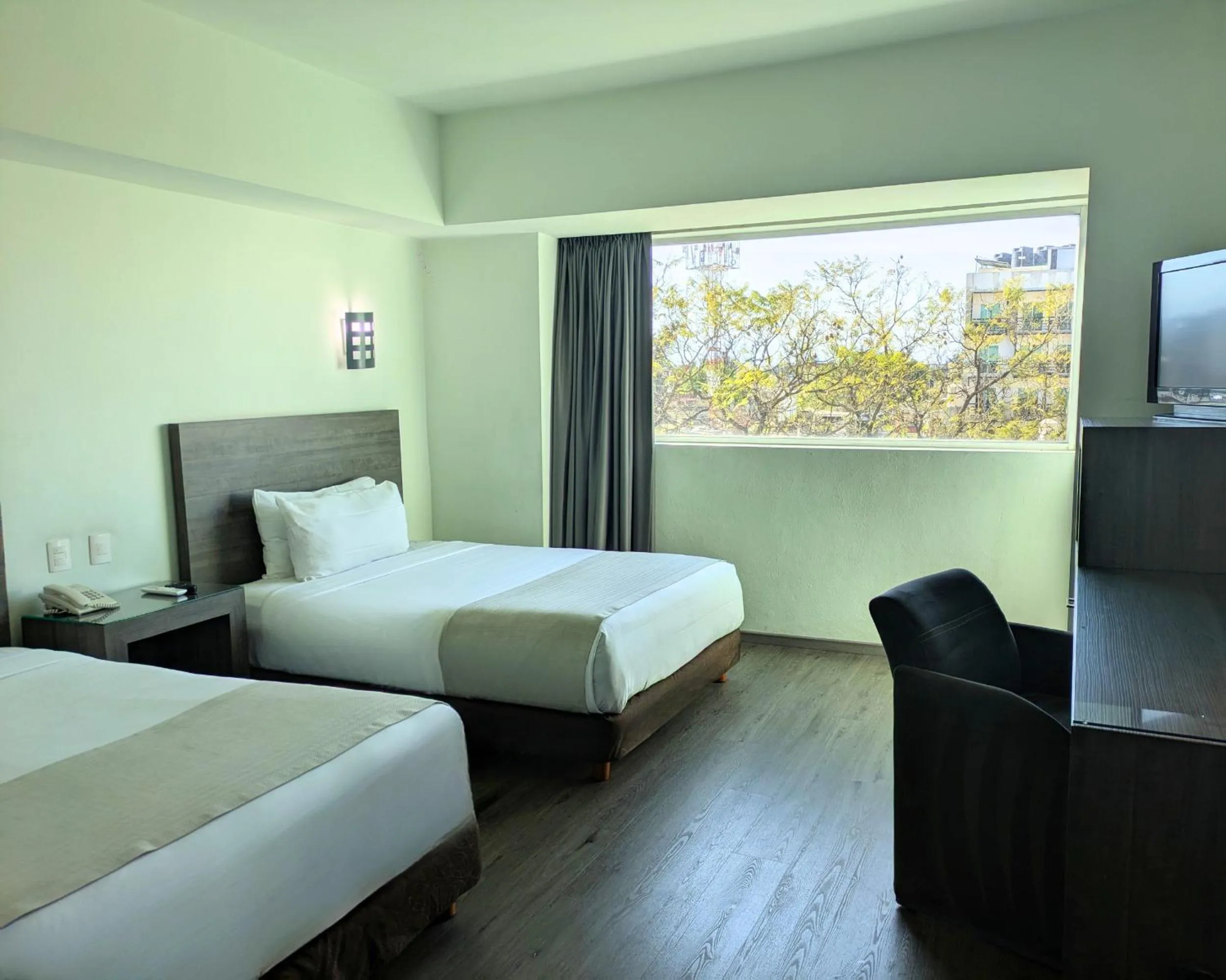 Bed in We Hotel Aeropuerto