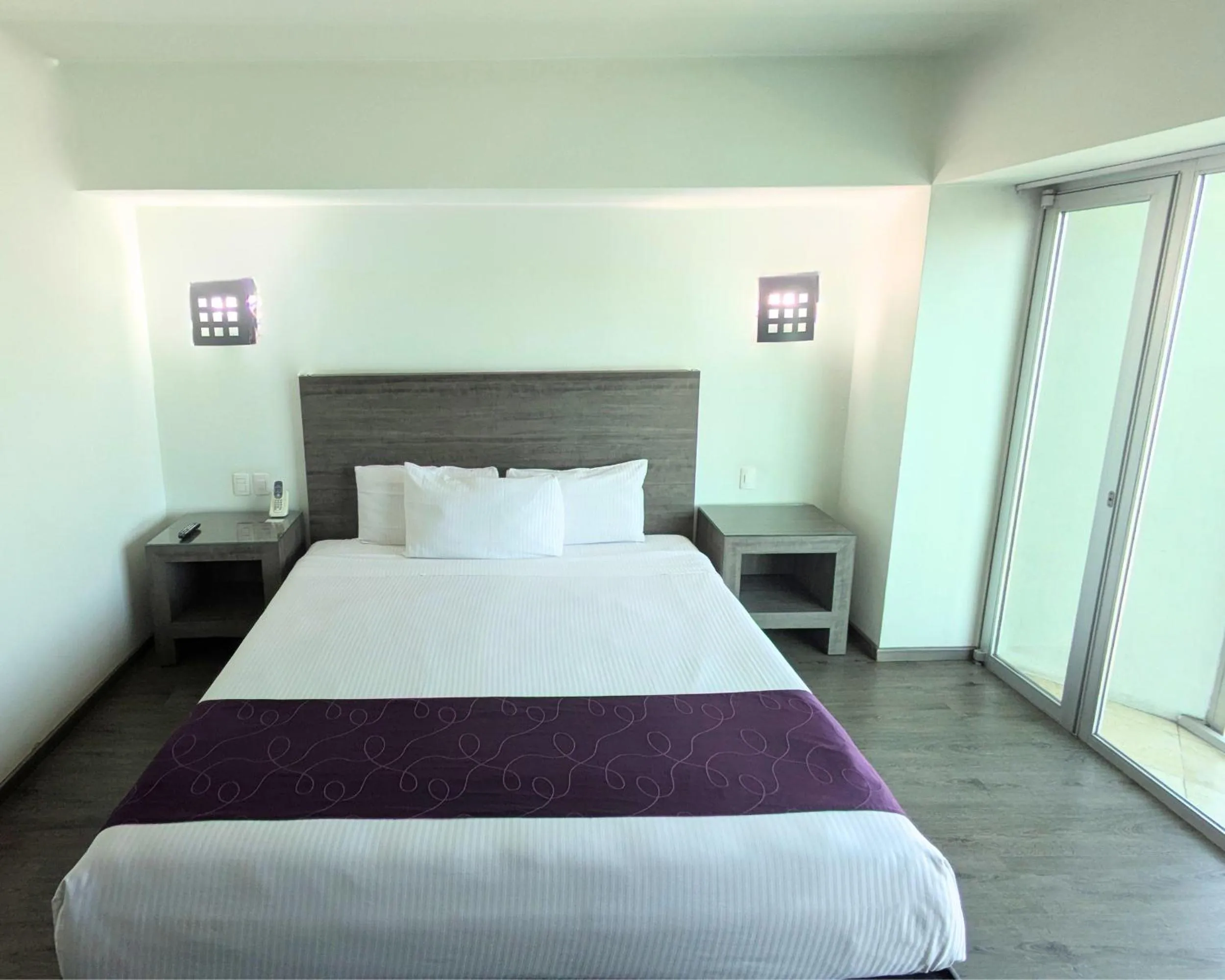 Bed in We Hotel Aeropuerto